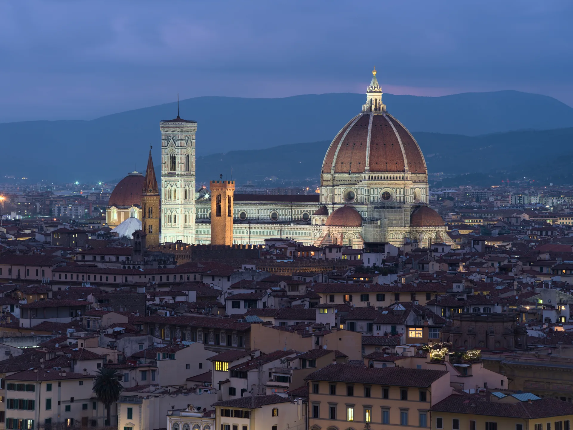 Florence Cathedral illuminated at night, seen from Piazzale Michelangelo