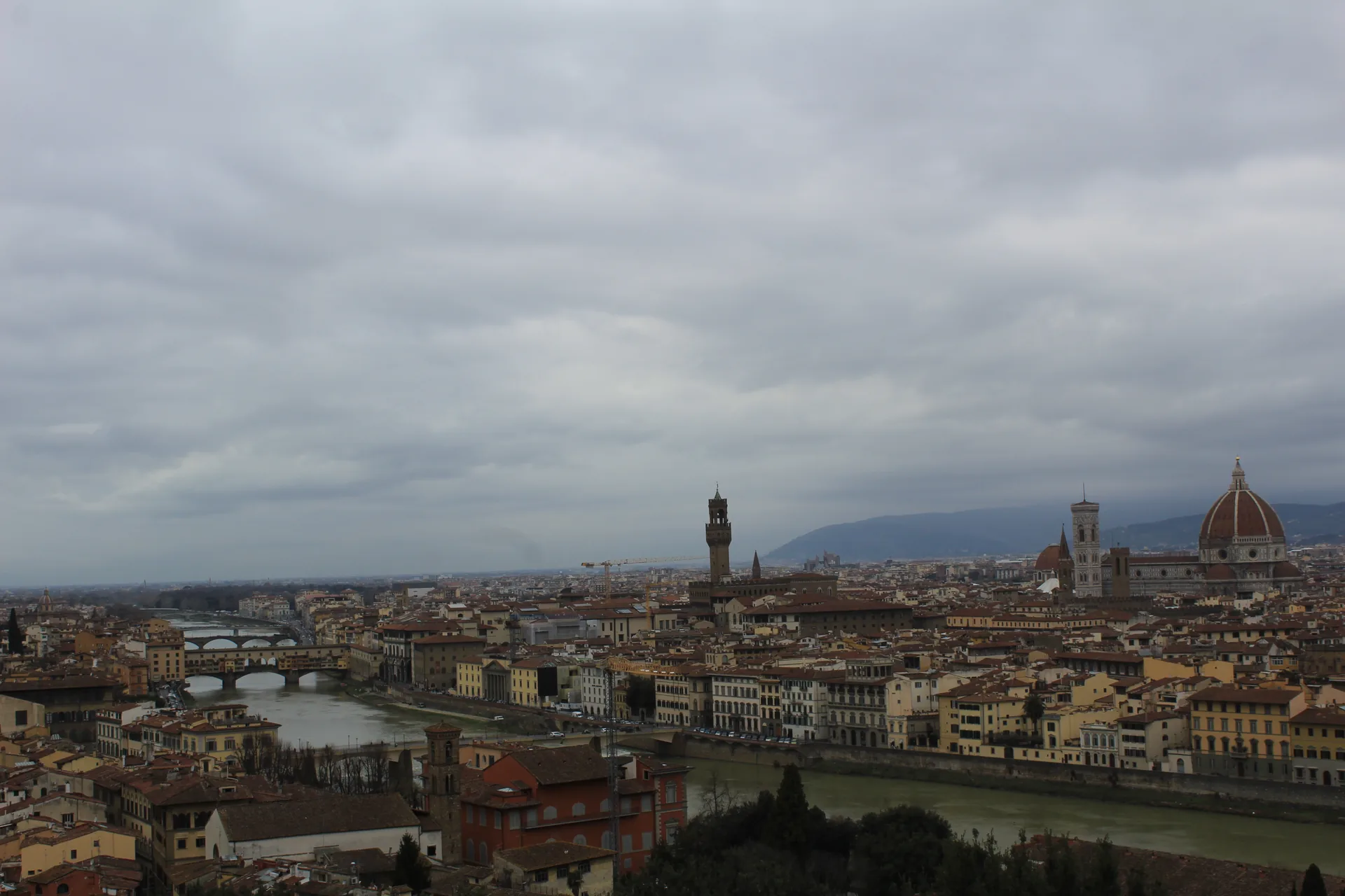 Panoramic view of Florence skyline with the Cathedral, Palazzo Vecchio and the Arno River seen from Piazzale Michelangelo