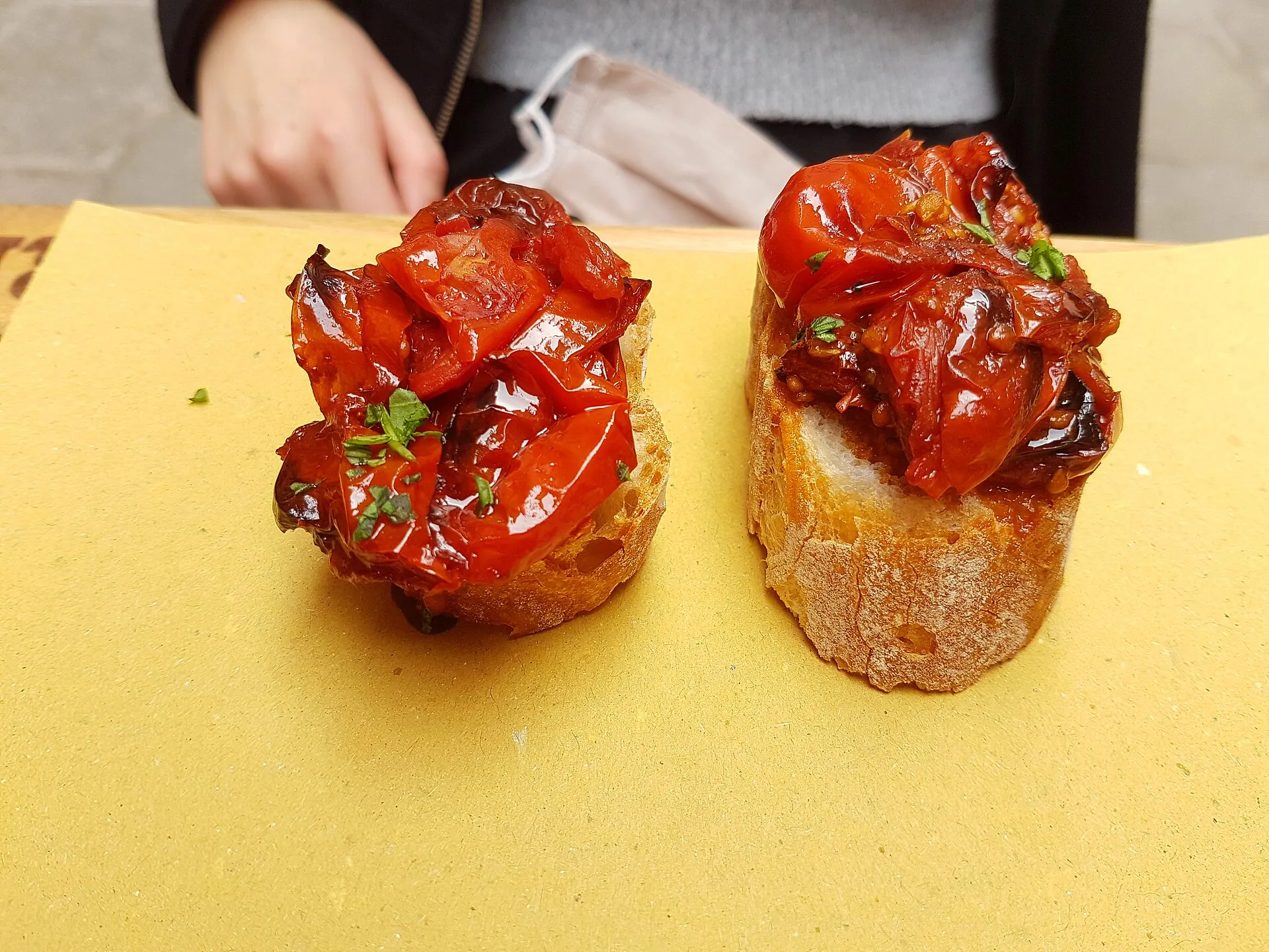 Two vegetarian cicchetti with dried tomatoes