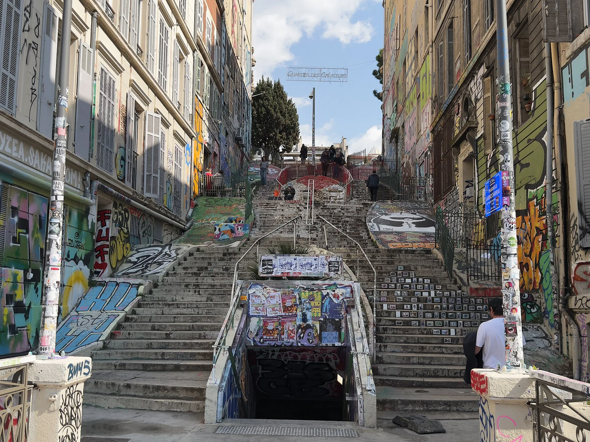 The monumental staircase at Cours Julien in Marseille, covered in graffiti and street art