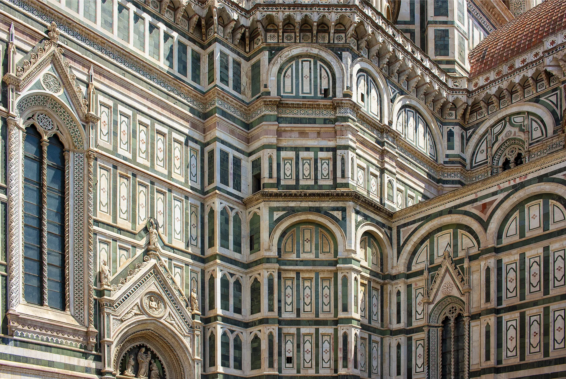 The ornate front façade of Florence Cathedral.