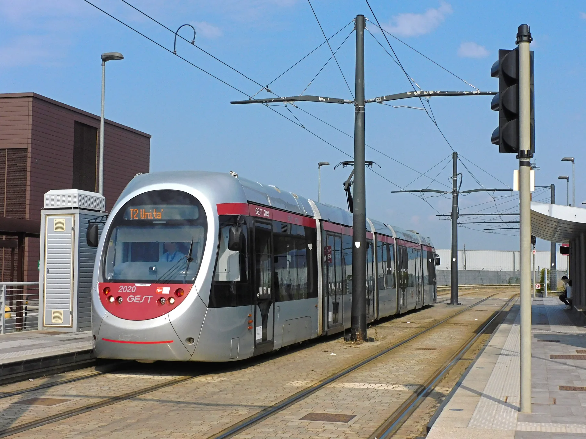 A HitachiRail Sirio tram stopped at the Peretola Aeroporto tram stop in Florence