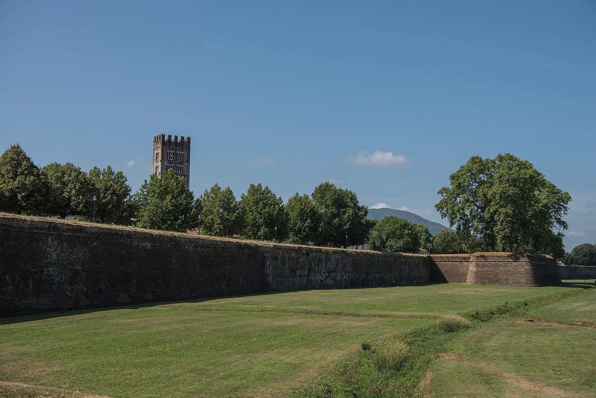 Lucca’s city walls with the surrounding lawn