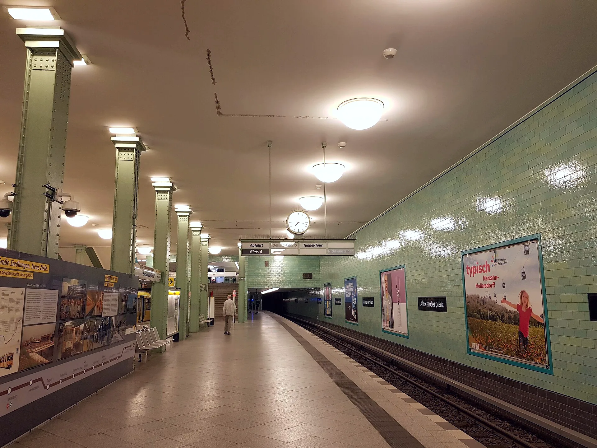 Entrance and platforms at Alexanderplatz U-Bahn station in Berlin.