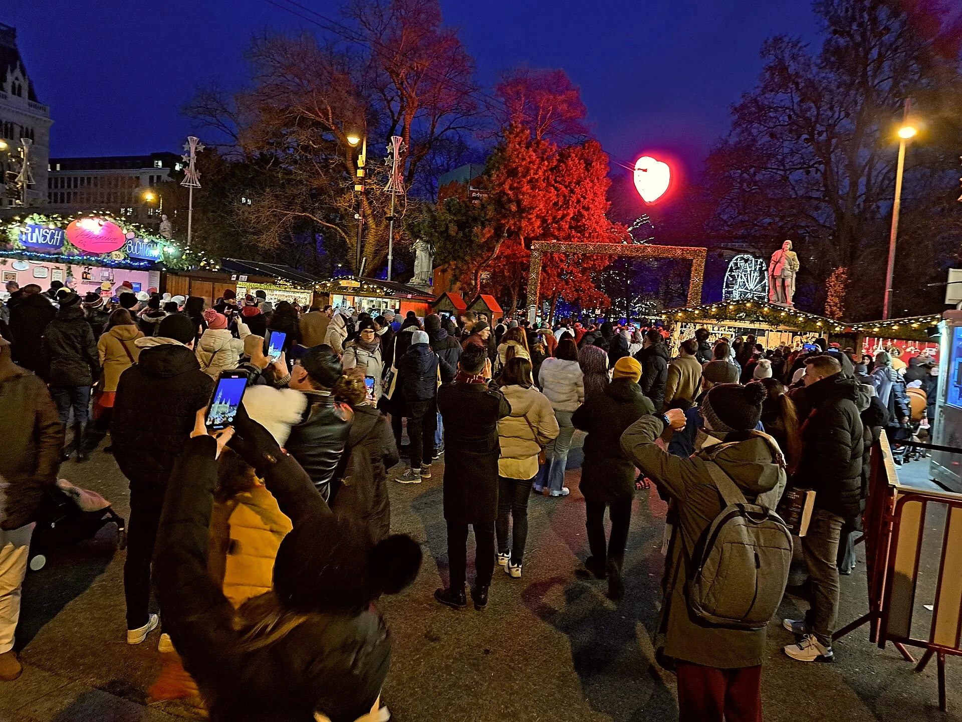 Visitors at the Christkindlmarkt on Rathausplatz in Vienna.