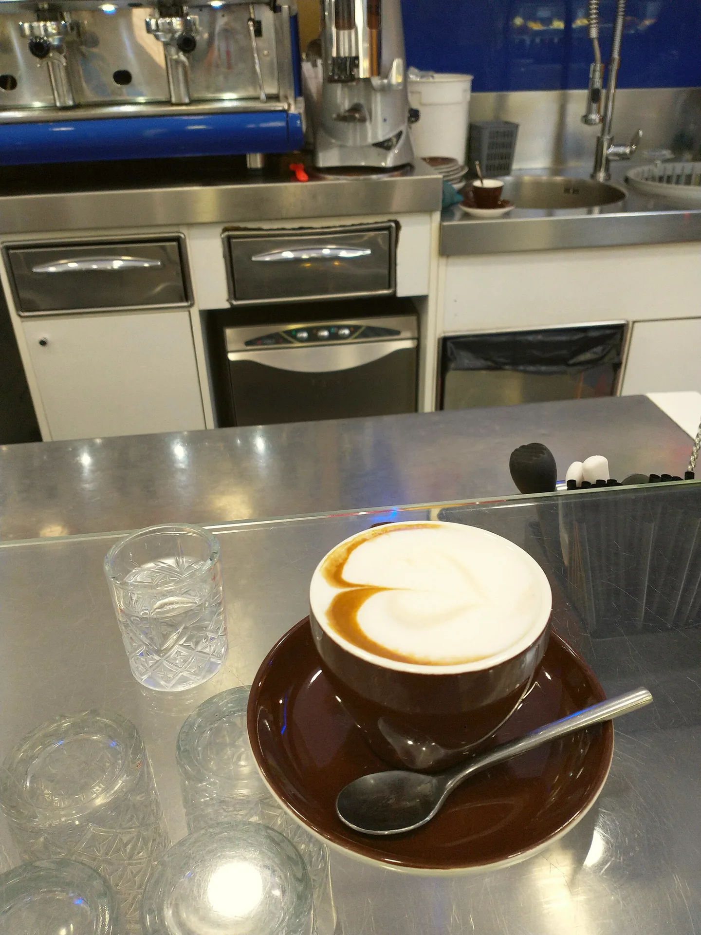 A cup of coffee on a table in Turin.