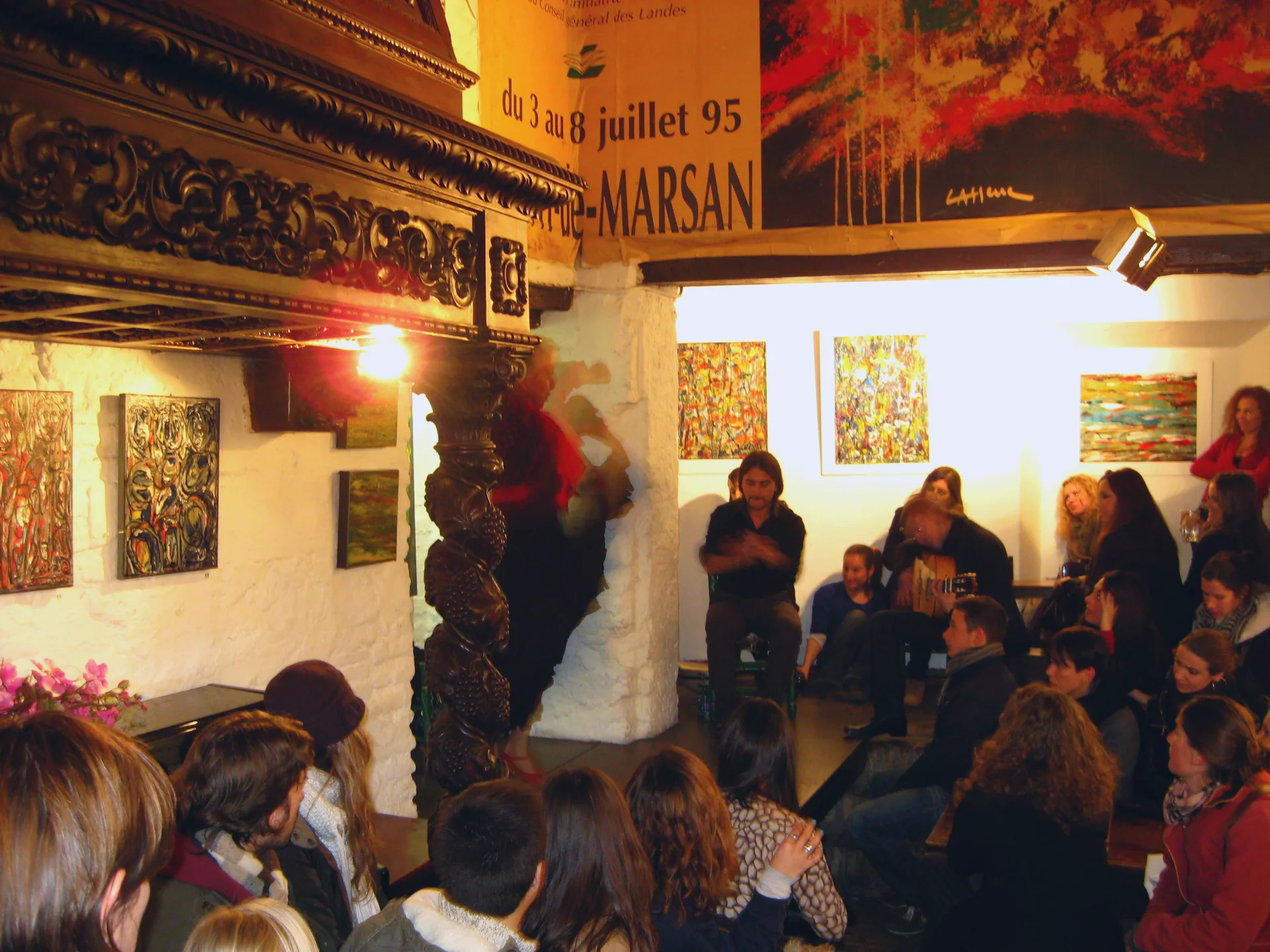 A flamenco dancer performing in a venue in Seville.