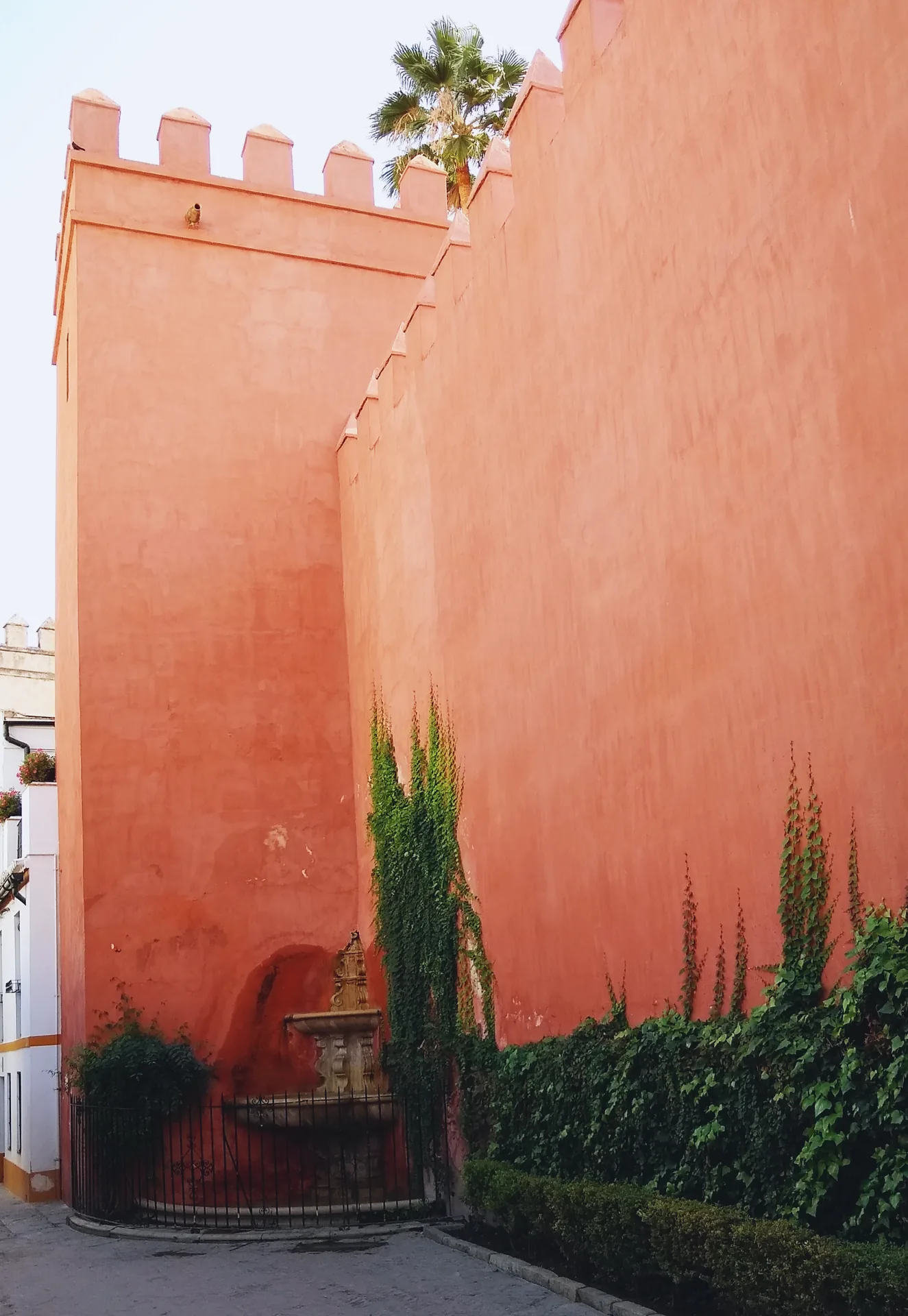 A narrow street in the Santa Cruz quarter of Seville.