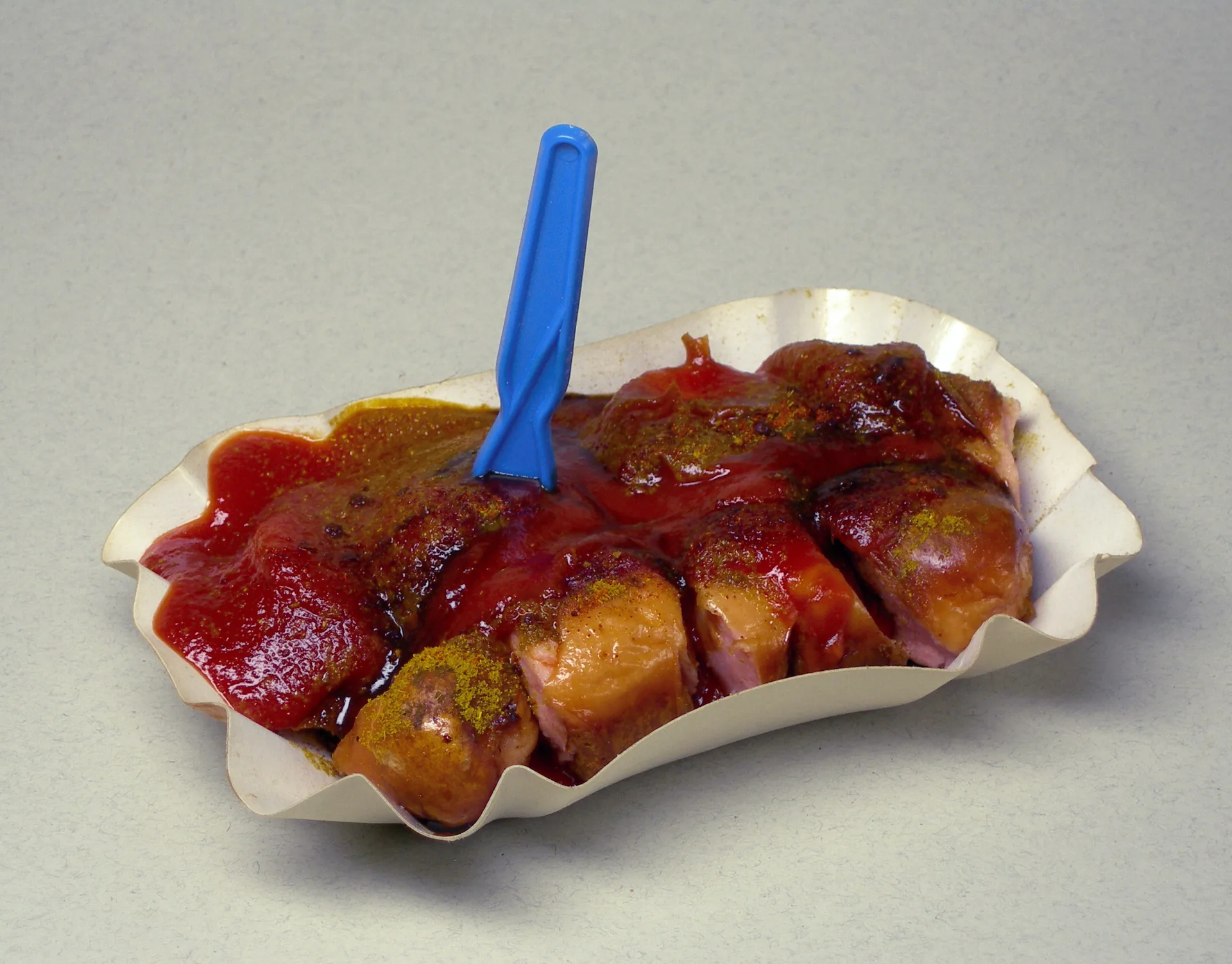 A serving of Berlin-style currywurst.