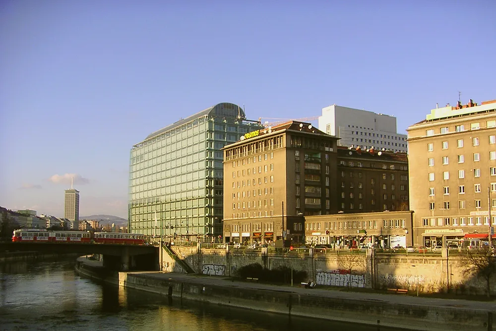 The Danube Canal at Schwedenplatz, with the Ringturm visible in the background.