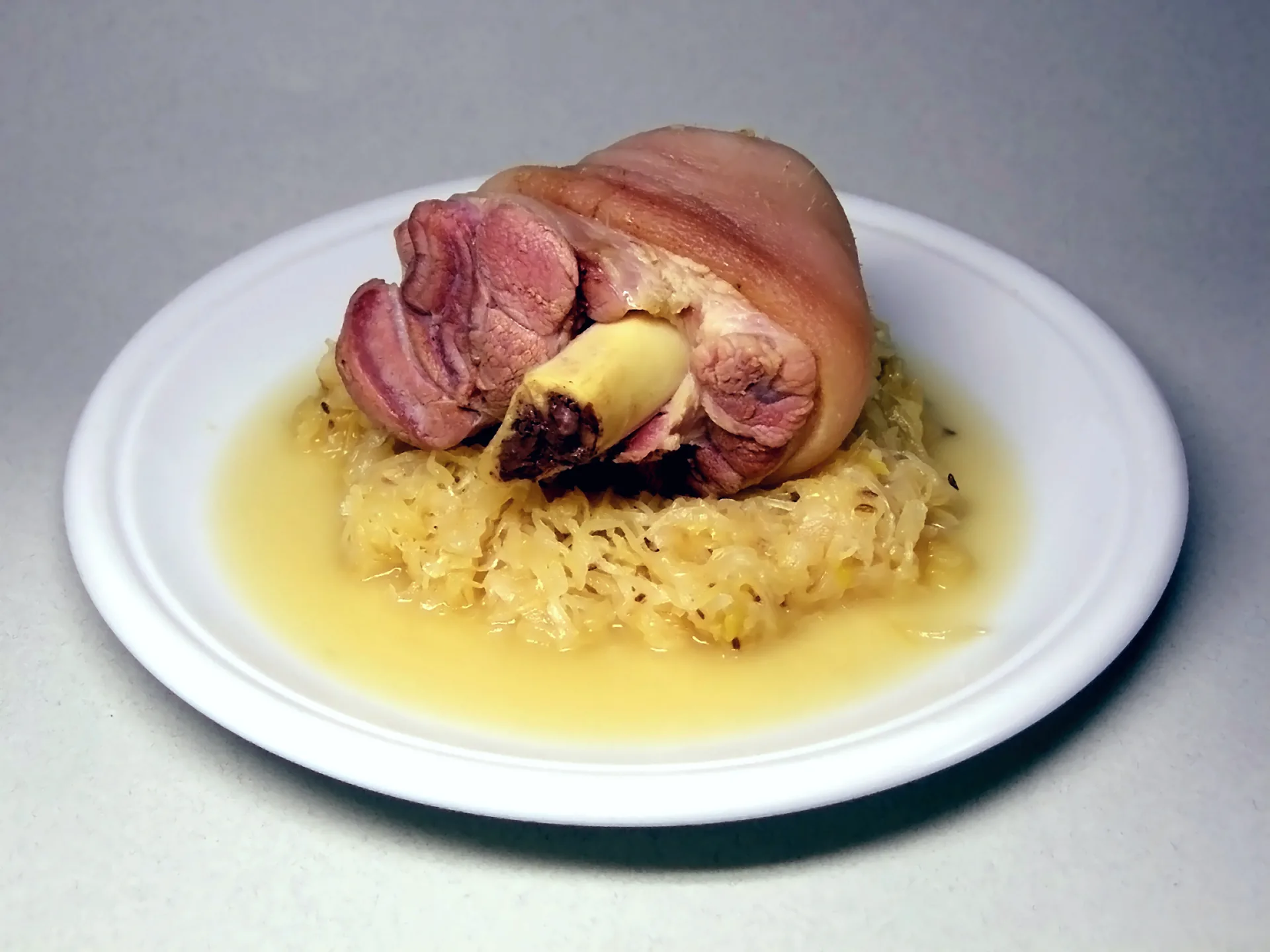 Pickled Eisbein served with sauerkraut.