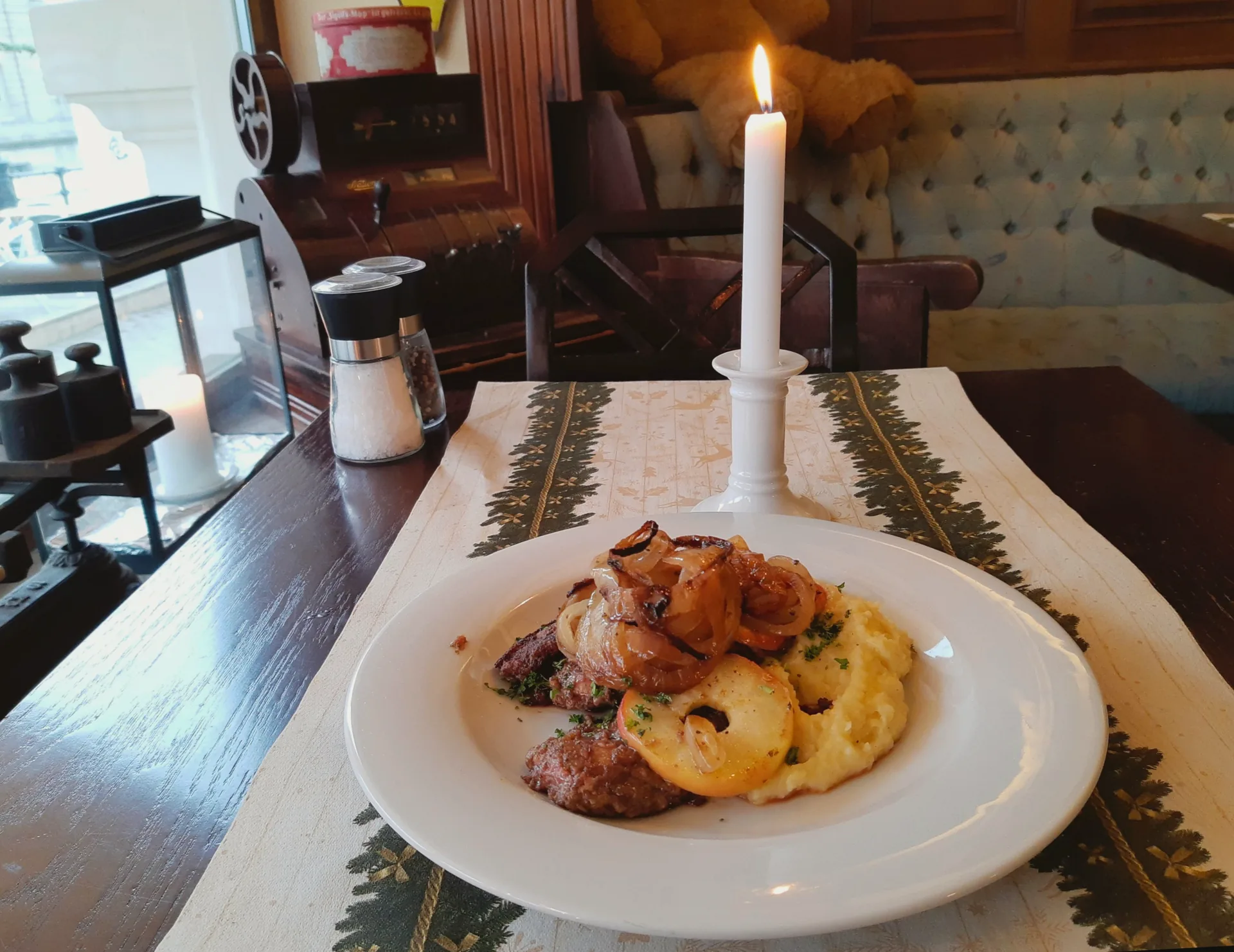 Liver with mashed potatoes, fried apple rings and onions at Zillestube in Berlin.