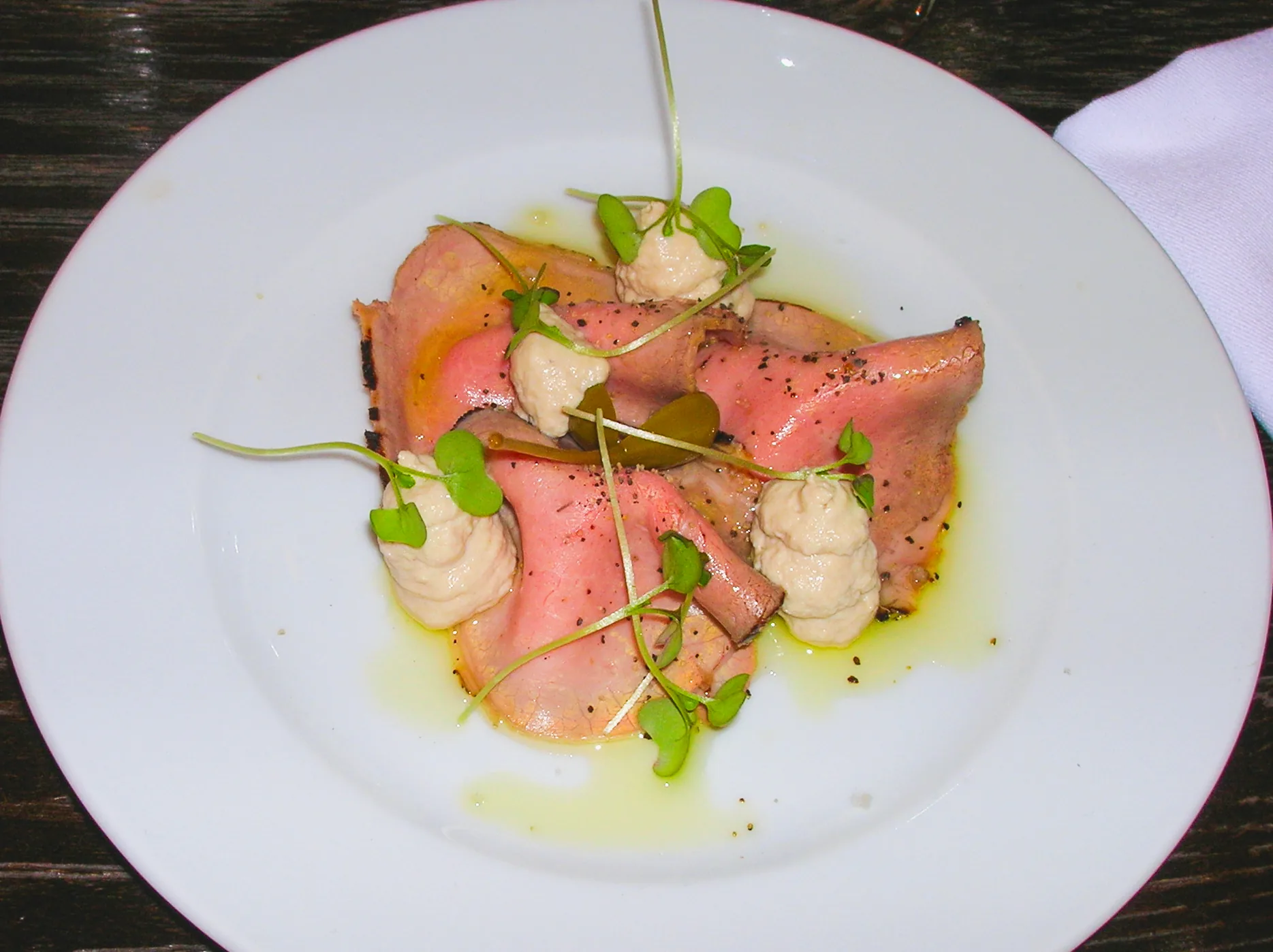 Vitello tonnato, sliced veal with tuna sauce.