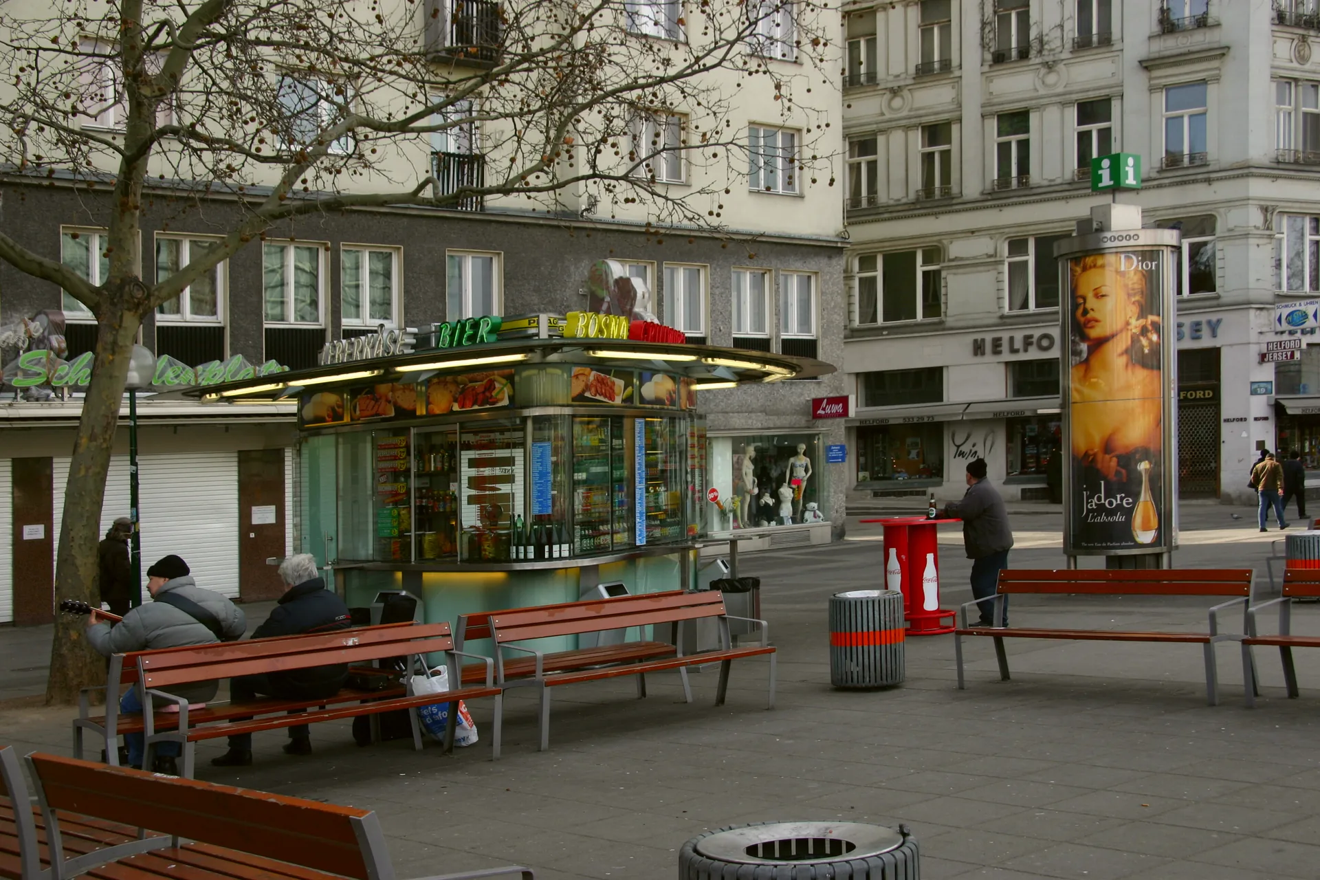 Schwedenplatz, a public square in Vienna, with surrounding buildings and a tram stop.