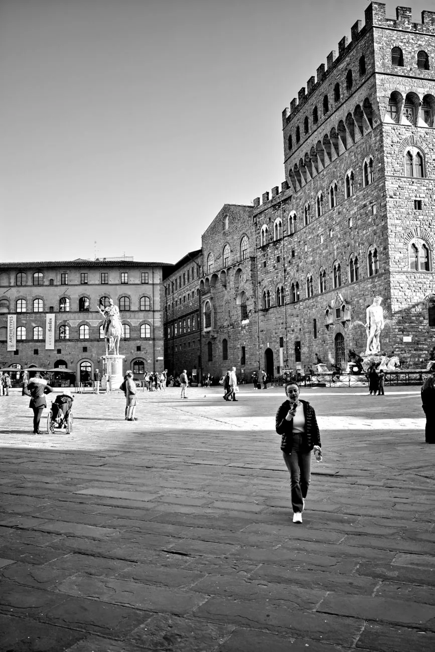 Visitors and historic buildings in Piazza della Signoria, Florence