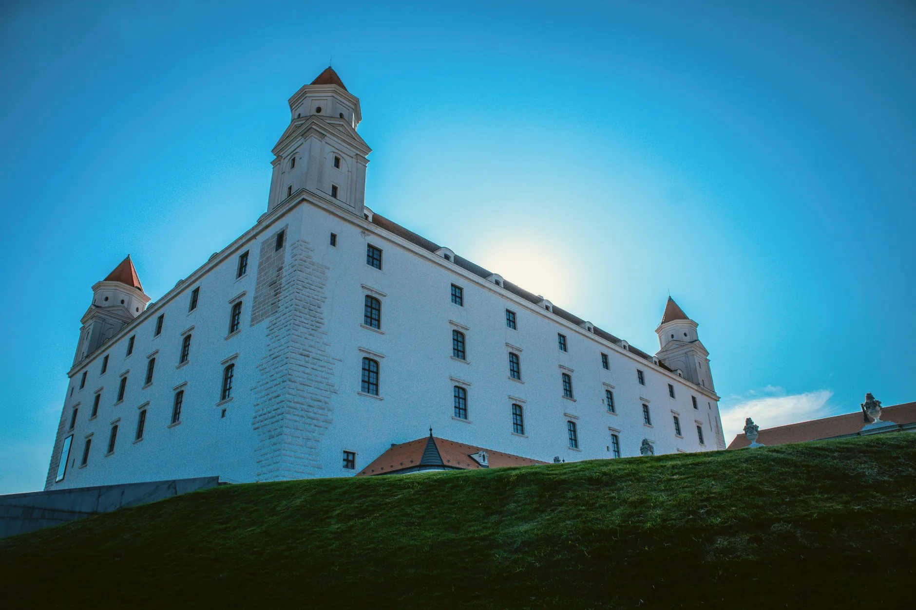 Bratislava Castle beneath a bright blue sky.
