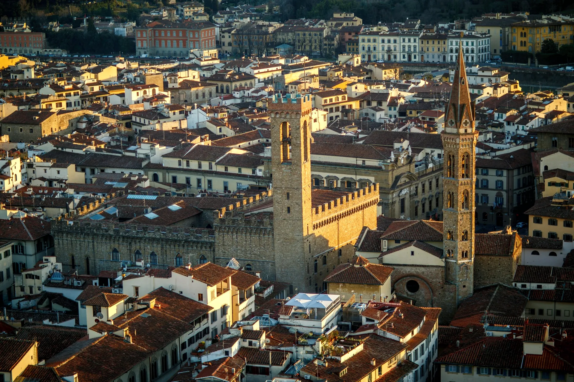 Florence rooftops at dusk, with the Bargello museum’s tower beside the Badia Fiorentina.