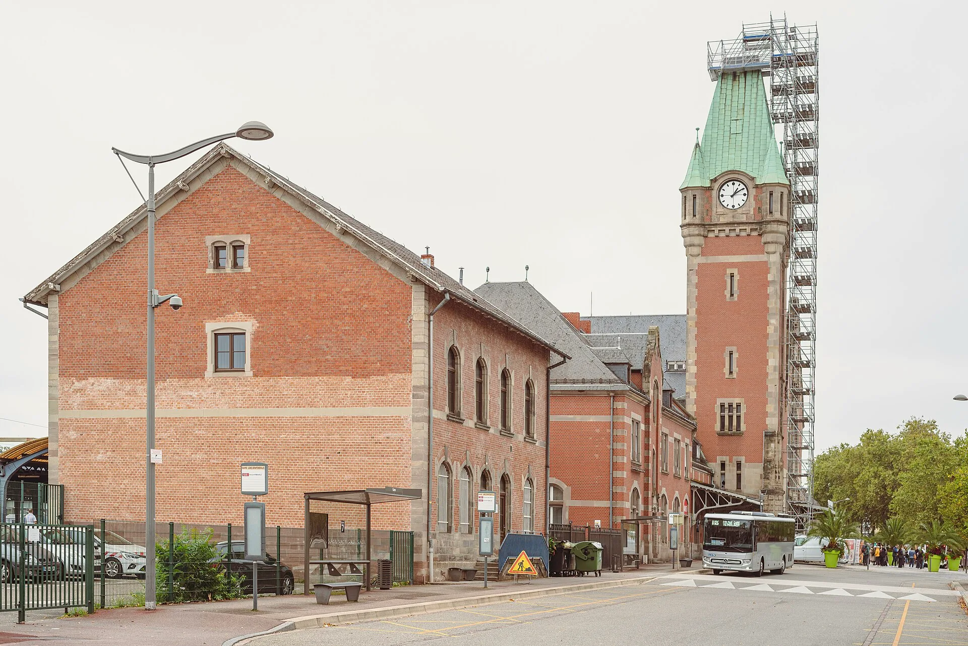 Colmar station’s entrance building and clock tower, with scaffolding around the tower.