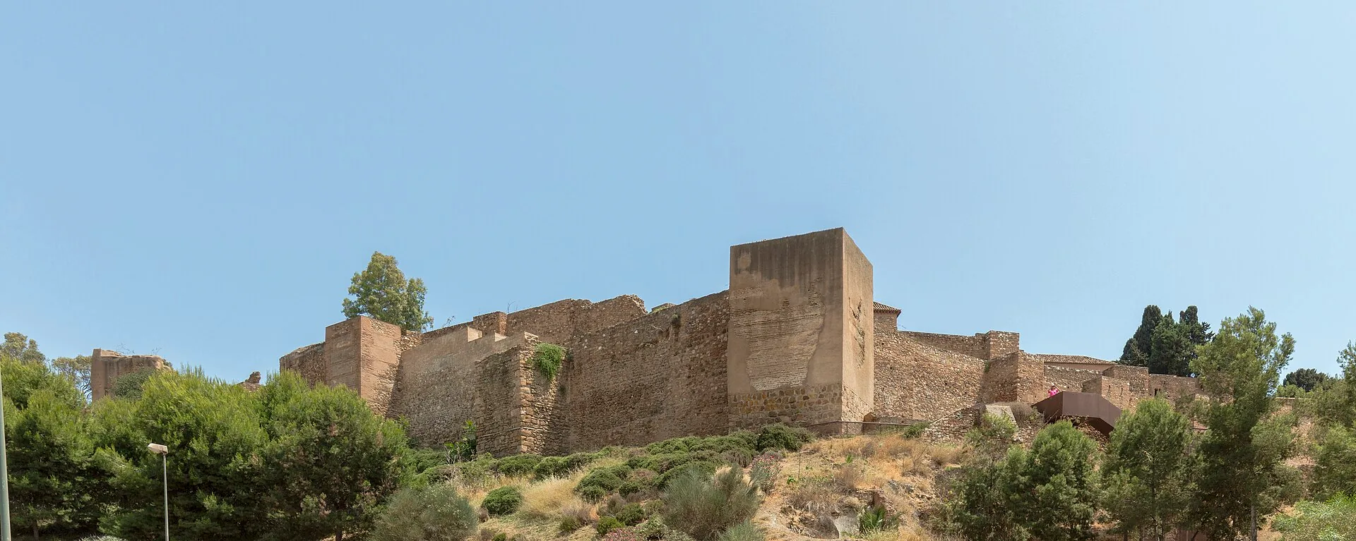 The Alcazaba of Málaga, a historic fortified complex of stone walls and buildings.