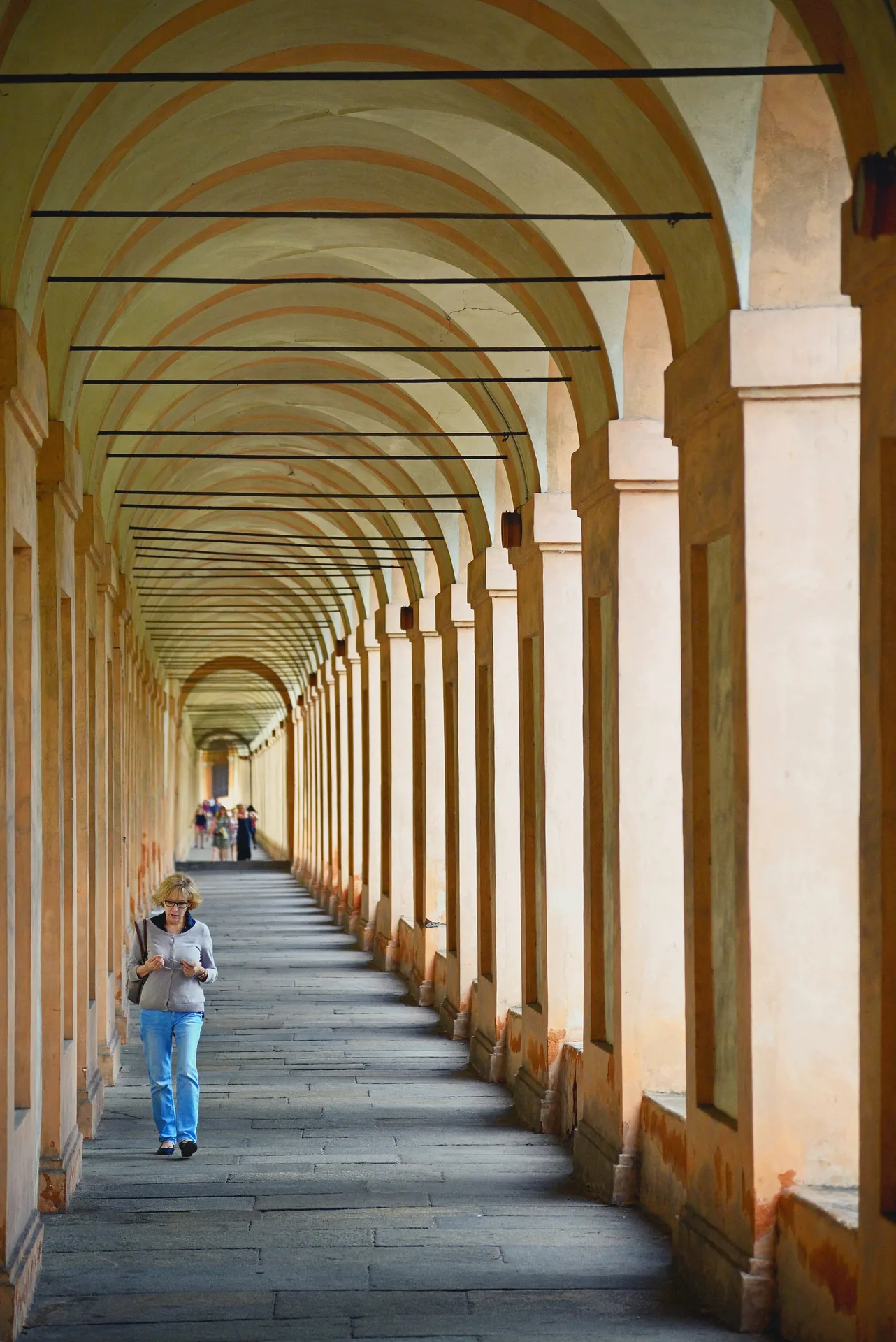 The arched portico leading to the Sanctuary of the Madonna di San Luca in Bologna.
