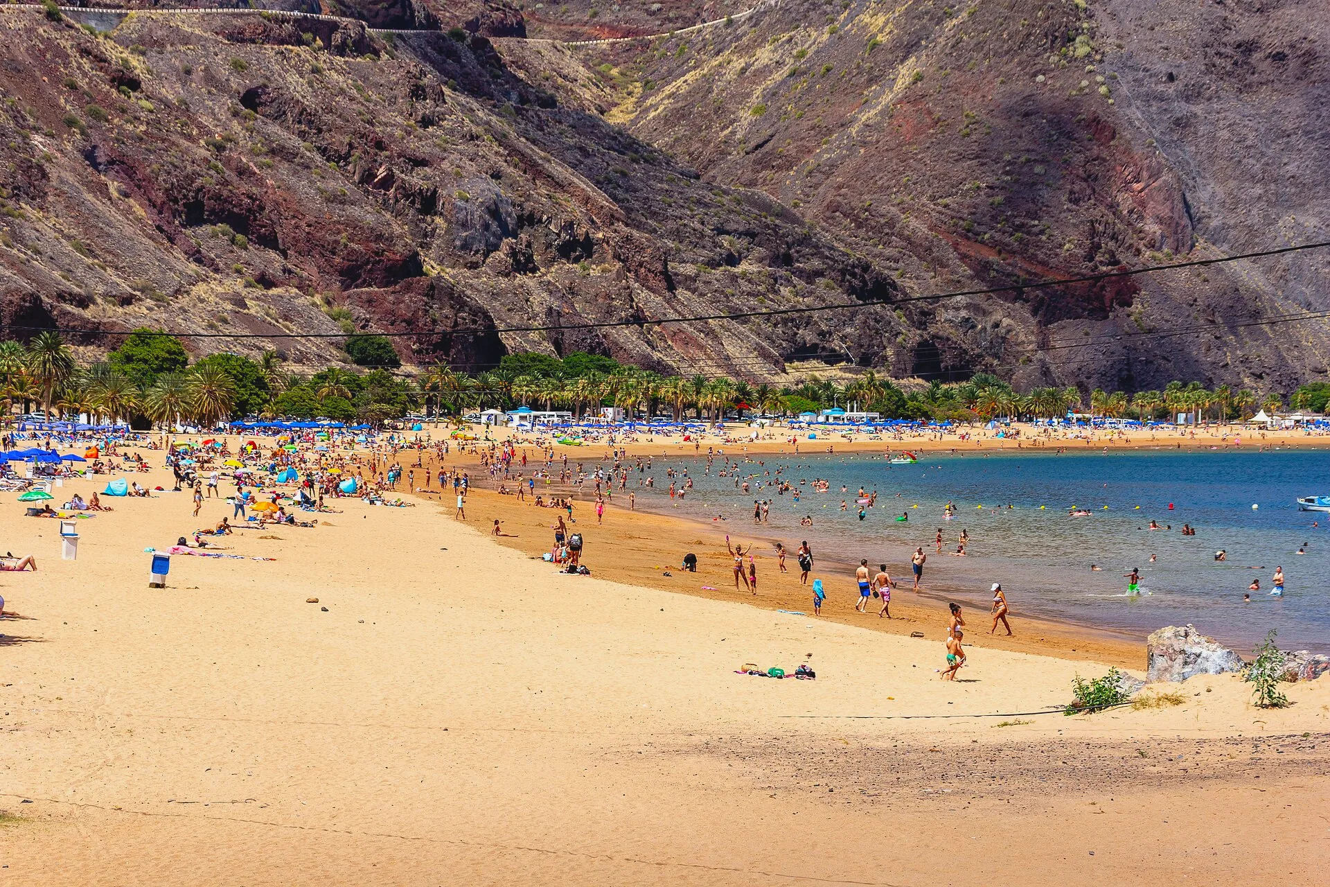 The sandy shore and water at Playa de las Teresitas