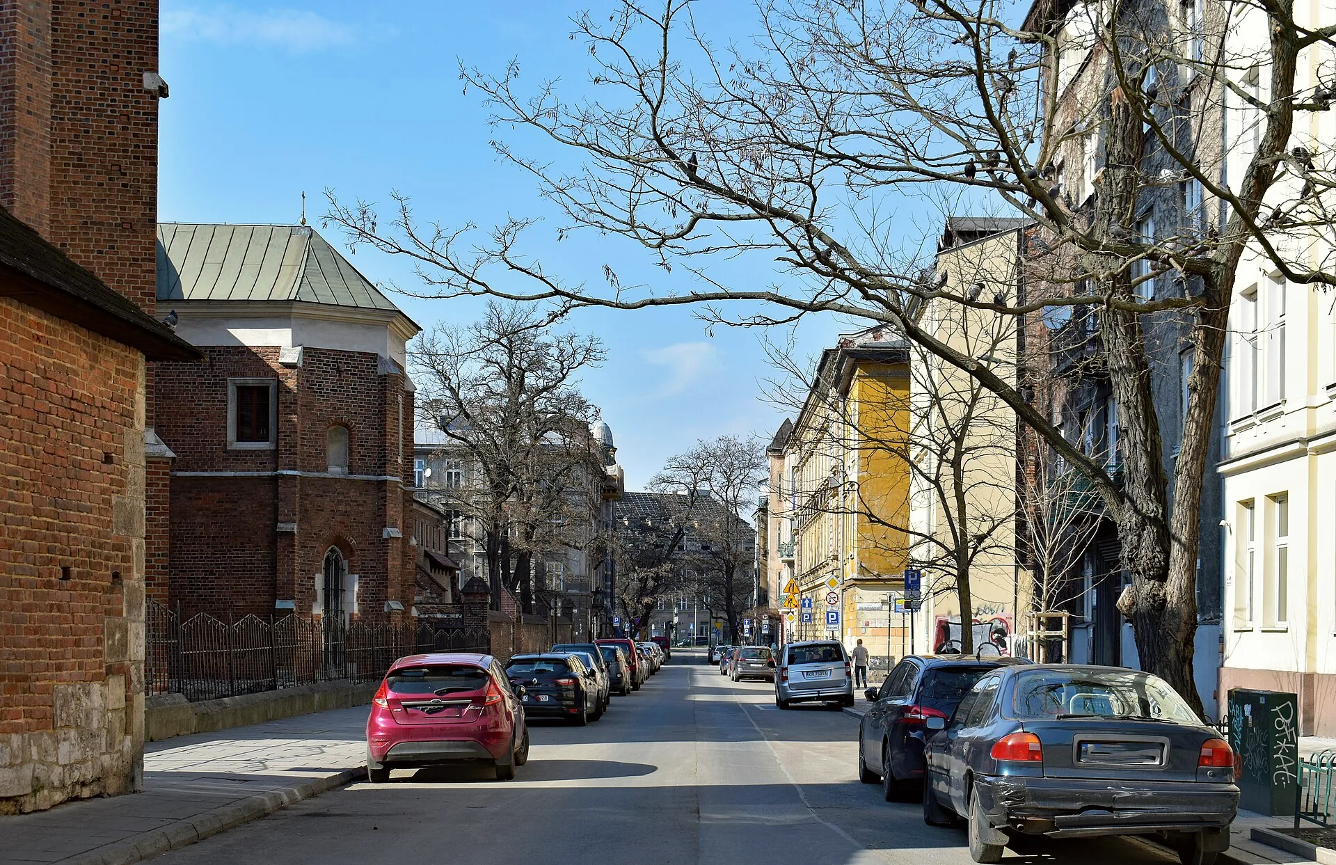 A north-facing view along Augustiańska Street in Kraków’s Kazimierz district.