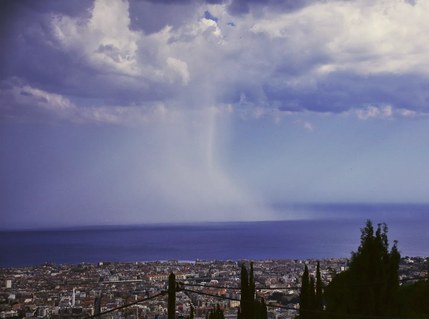 Rain falling in front of the Promenade des Anglais in Nice.