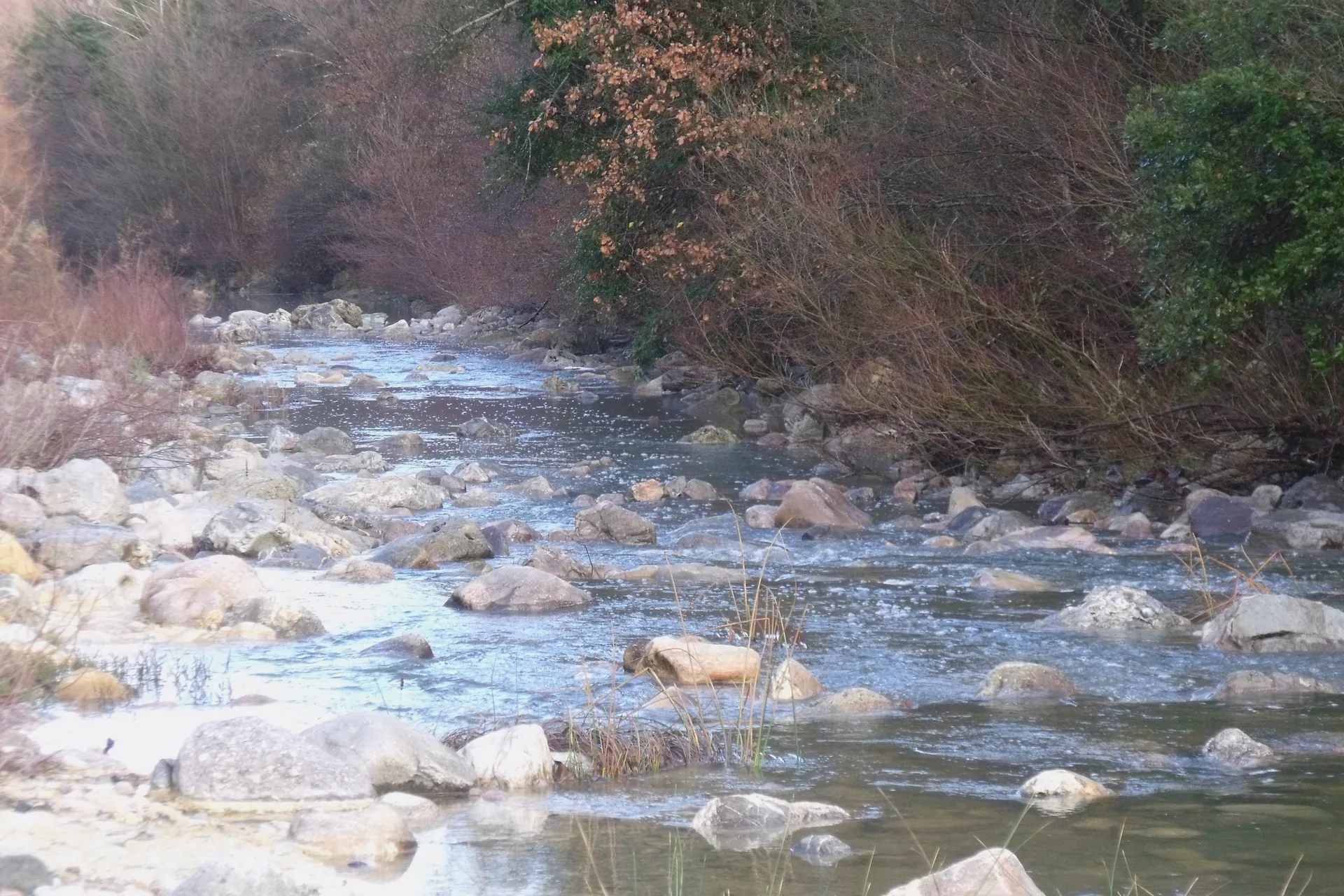The River Farma flowing beside the thermal bathing area at Bagni di Petriolo