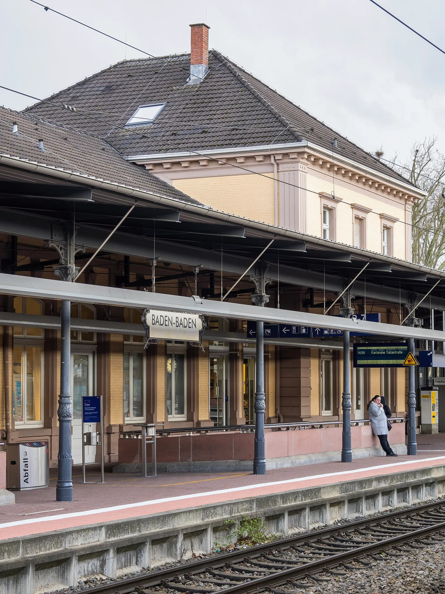 The entrance building of Baden-Baden railway station, with its station name above the doors.