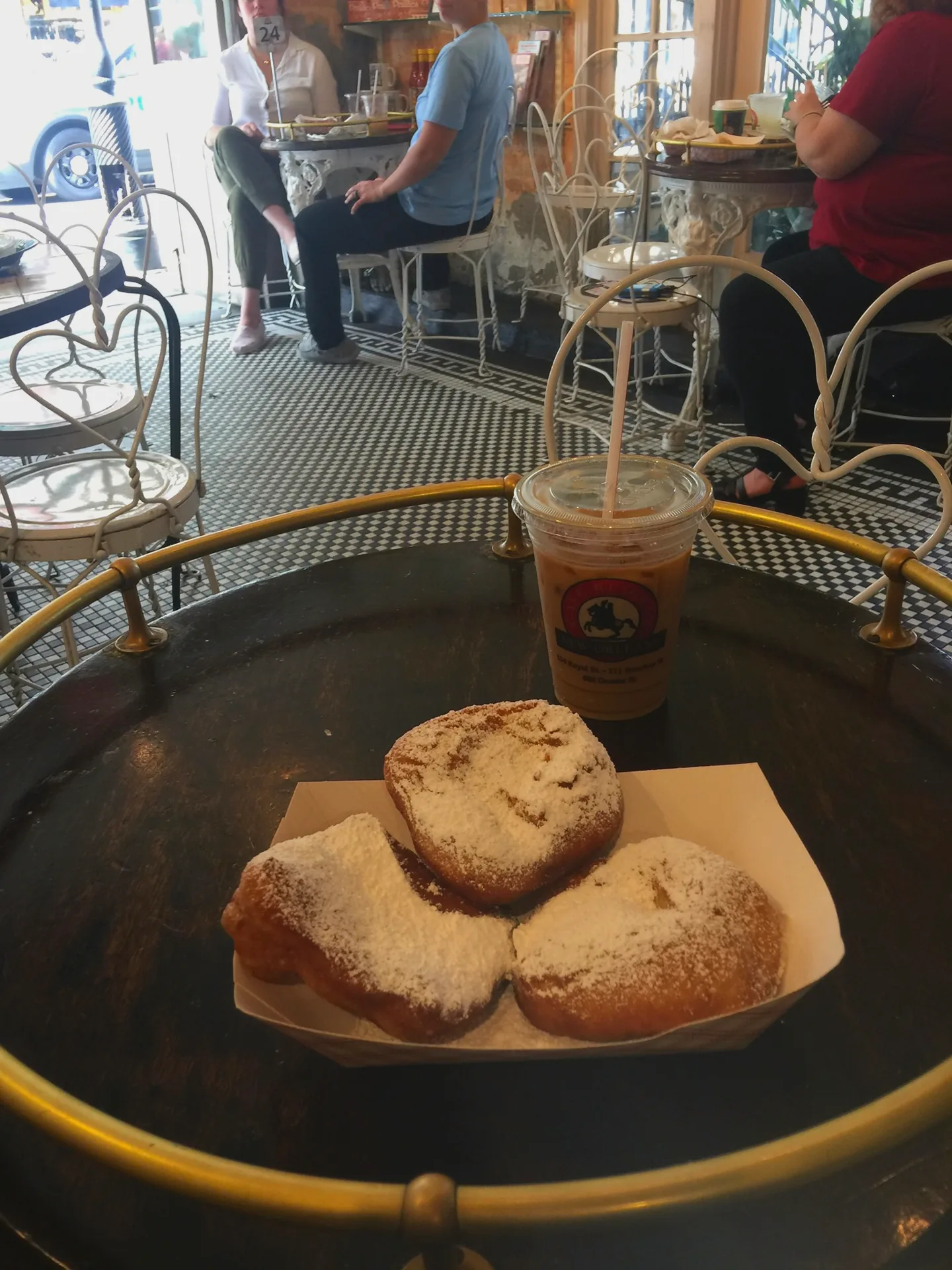 Beignets served with iced coffee
