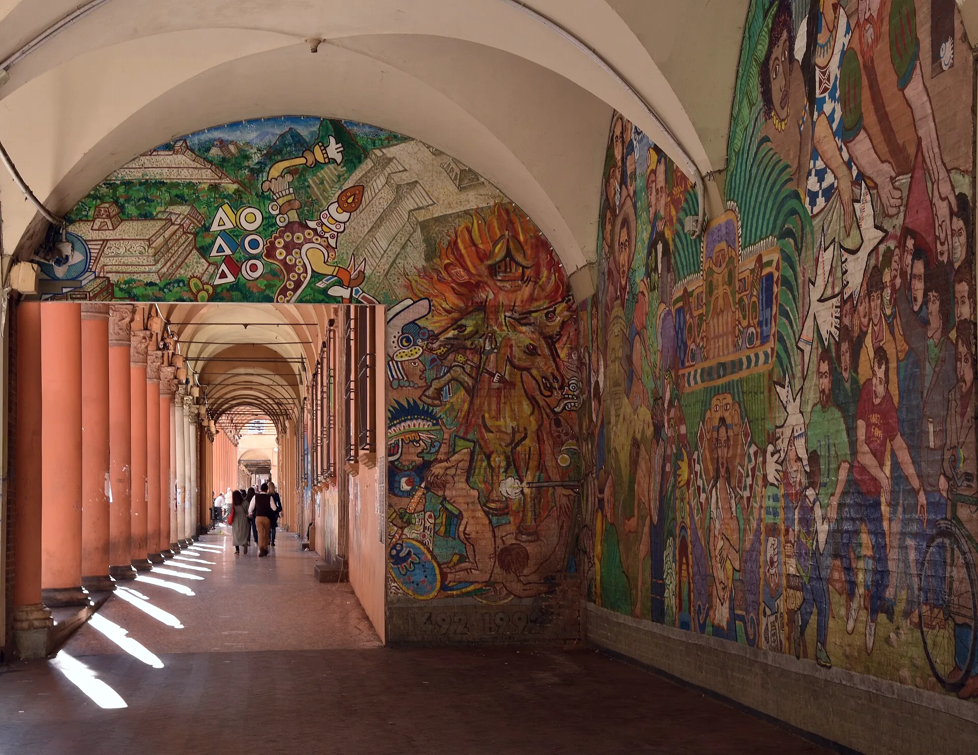 Porticoes line Via Zamboni in Bologna.