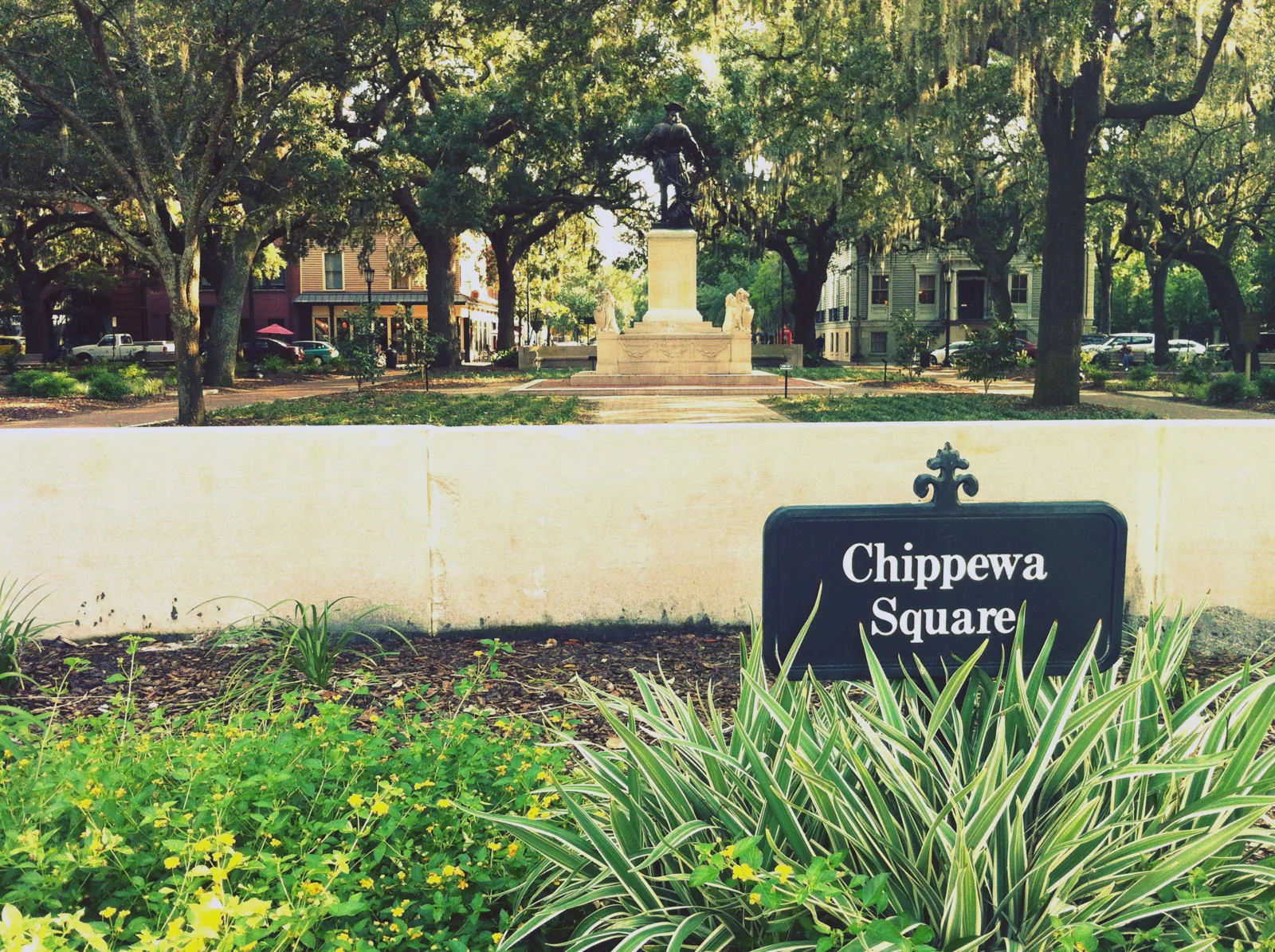 Trees and paths in Chippewa Square, viewed from W Hull Street.