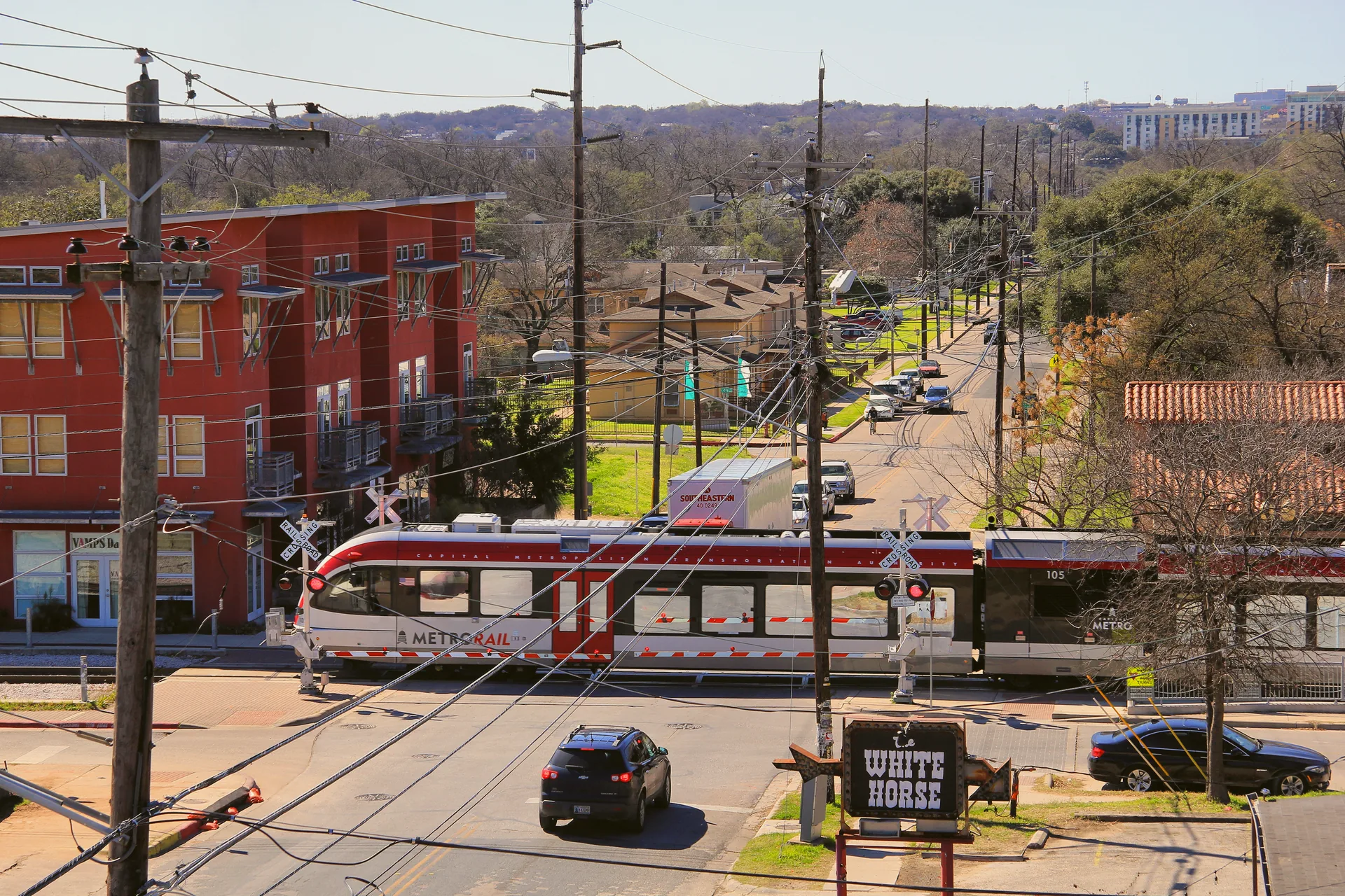 Comal Street with a Capital MetroRail train crossing it in Austin.