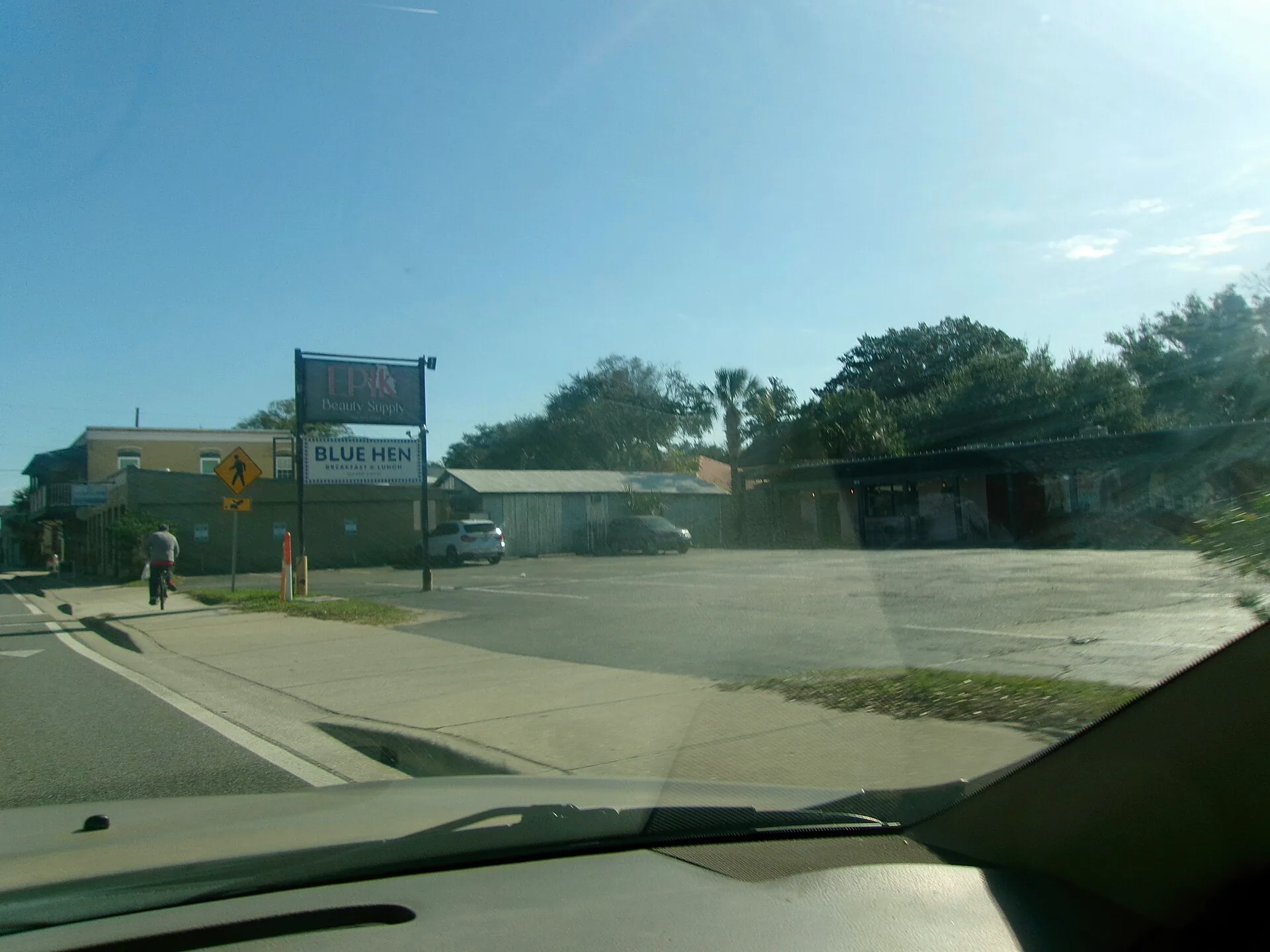 Corner shops and the Blue Hen Cafe at West King Street and South Leonard Street in St. Augustine.