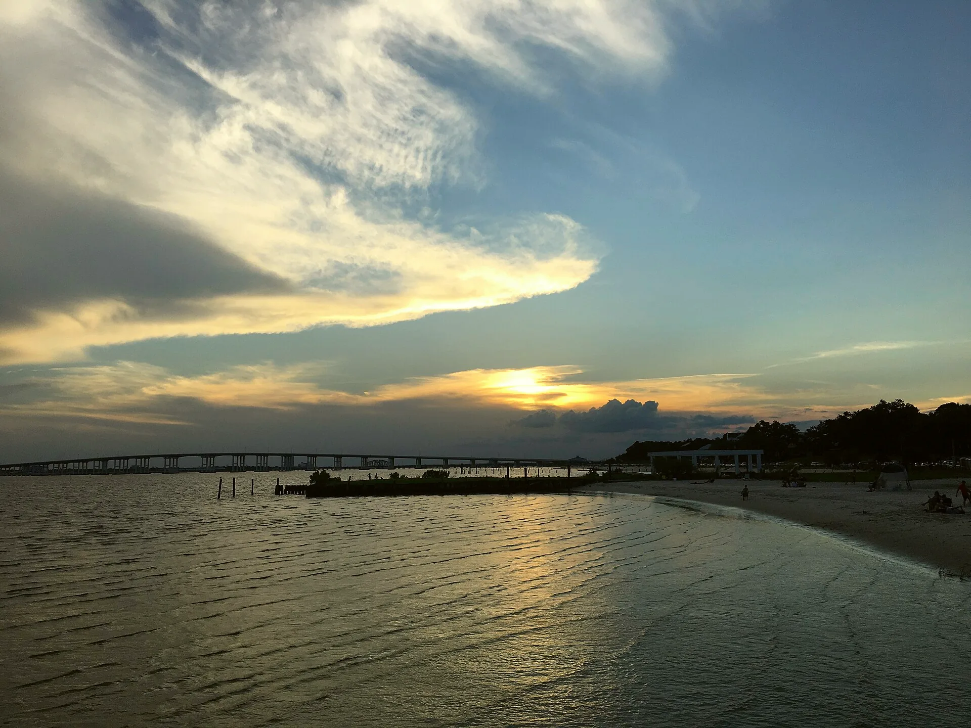 Shoreline at Front Beach in Ocean Springs, viewed from a pier.