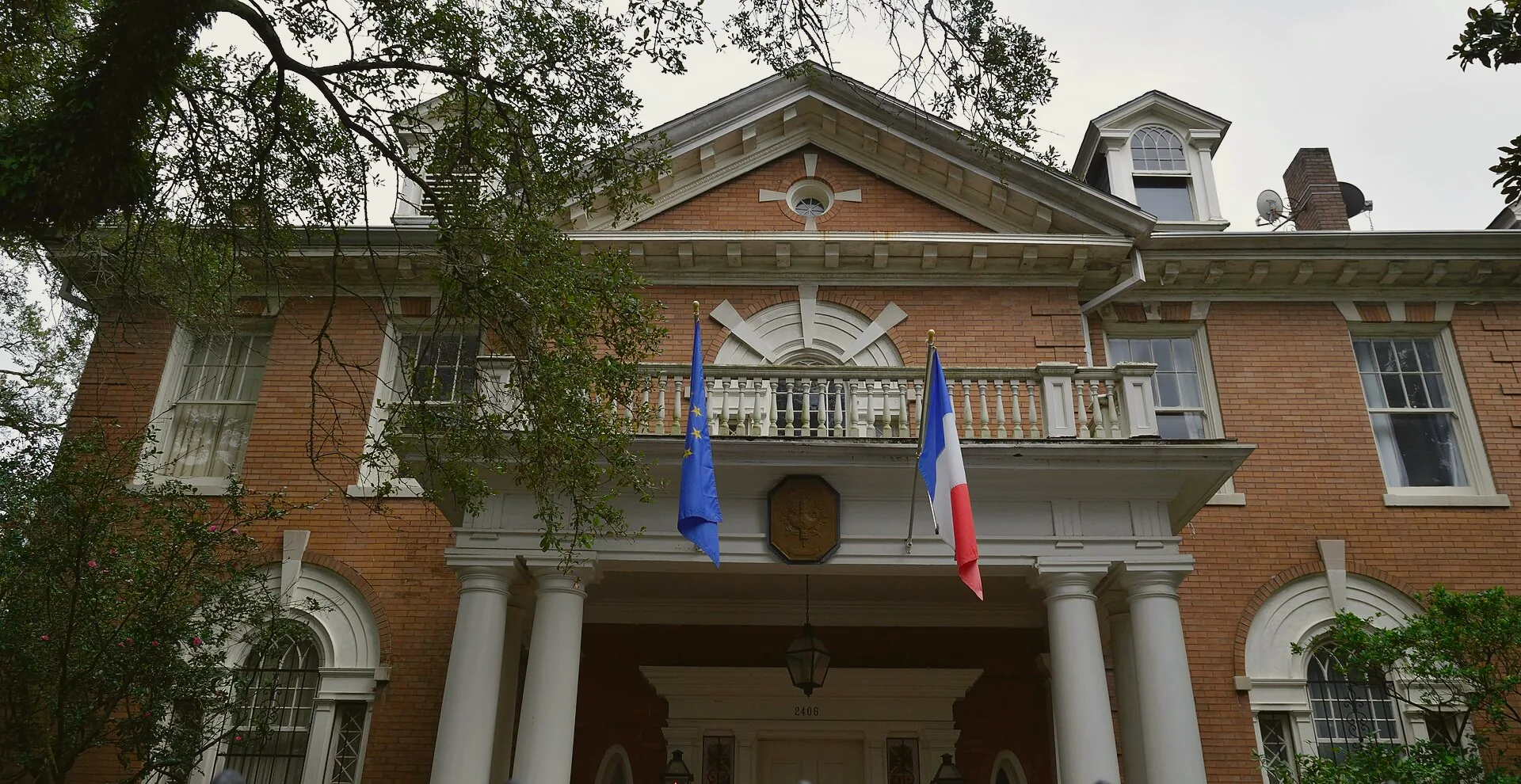 Historic houses with exterior staircases in New Orleans’ Garden District.