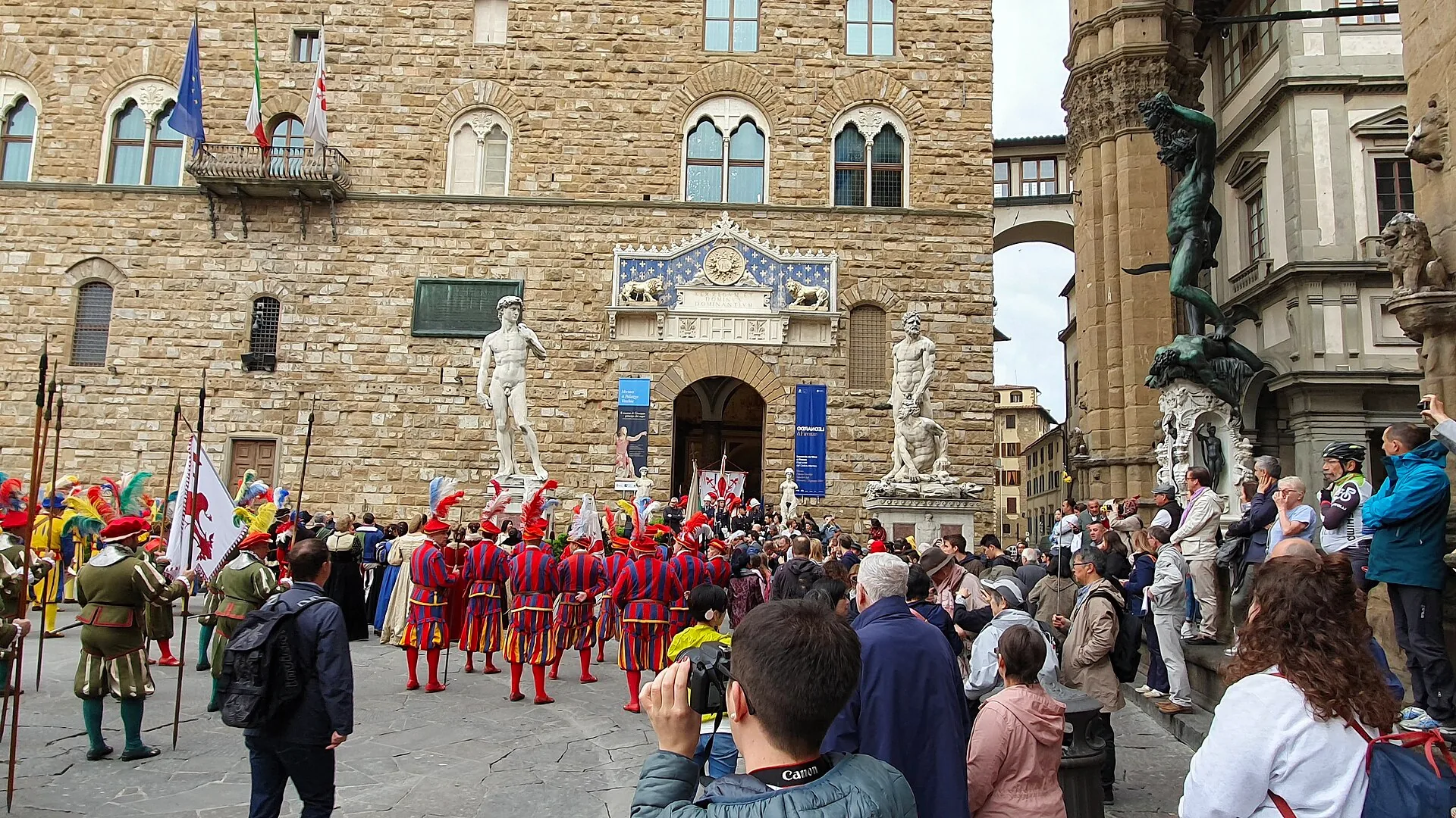 People gather in Florence before the Scoppio del carro Easter celebration.