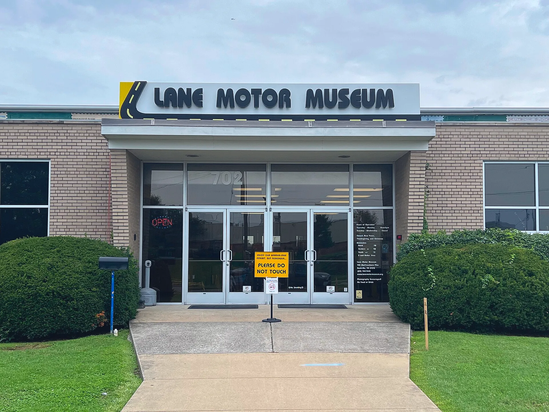 Entrance to the Lane Motor Museum in Nashville, with the museum name above the doors.