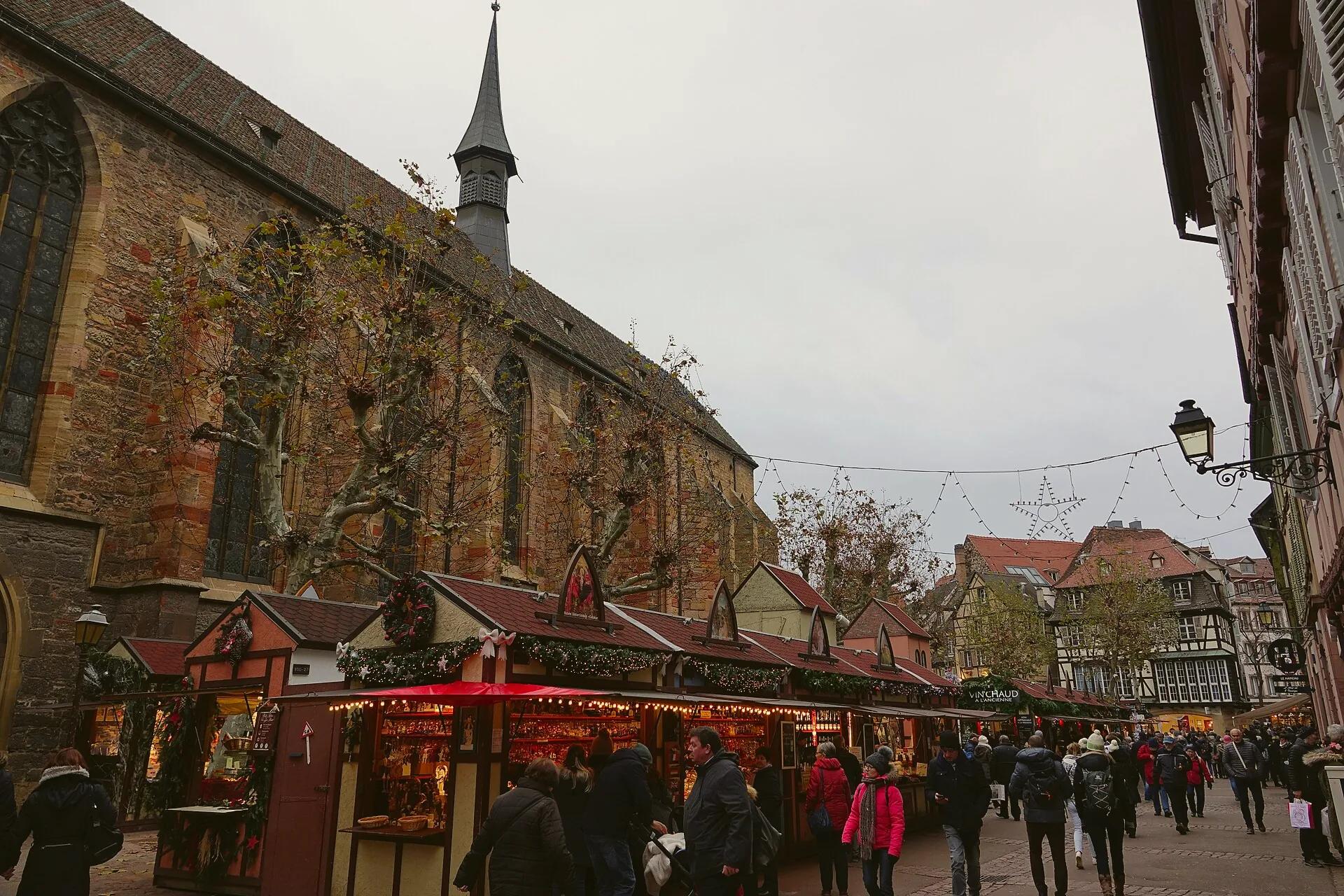 Christmas market stalls on Place des Dominicains in Colmar.