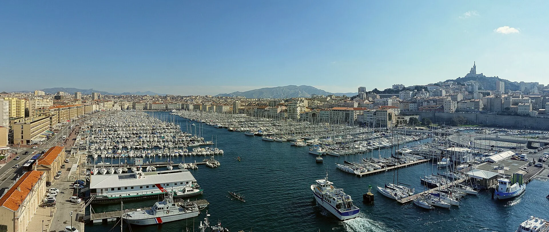 Panoramic view across the Vieux-Port of Marseille, with the harbour and waterfront buildings.
