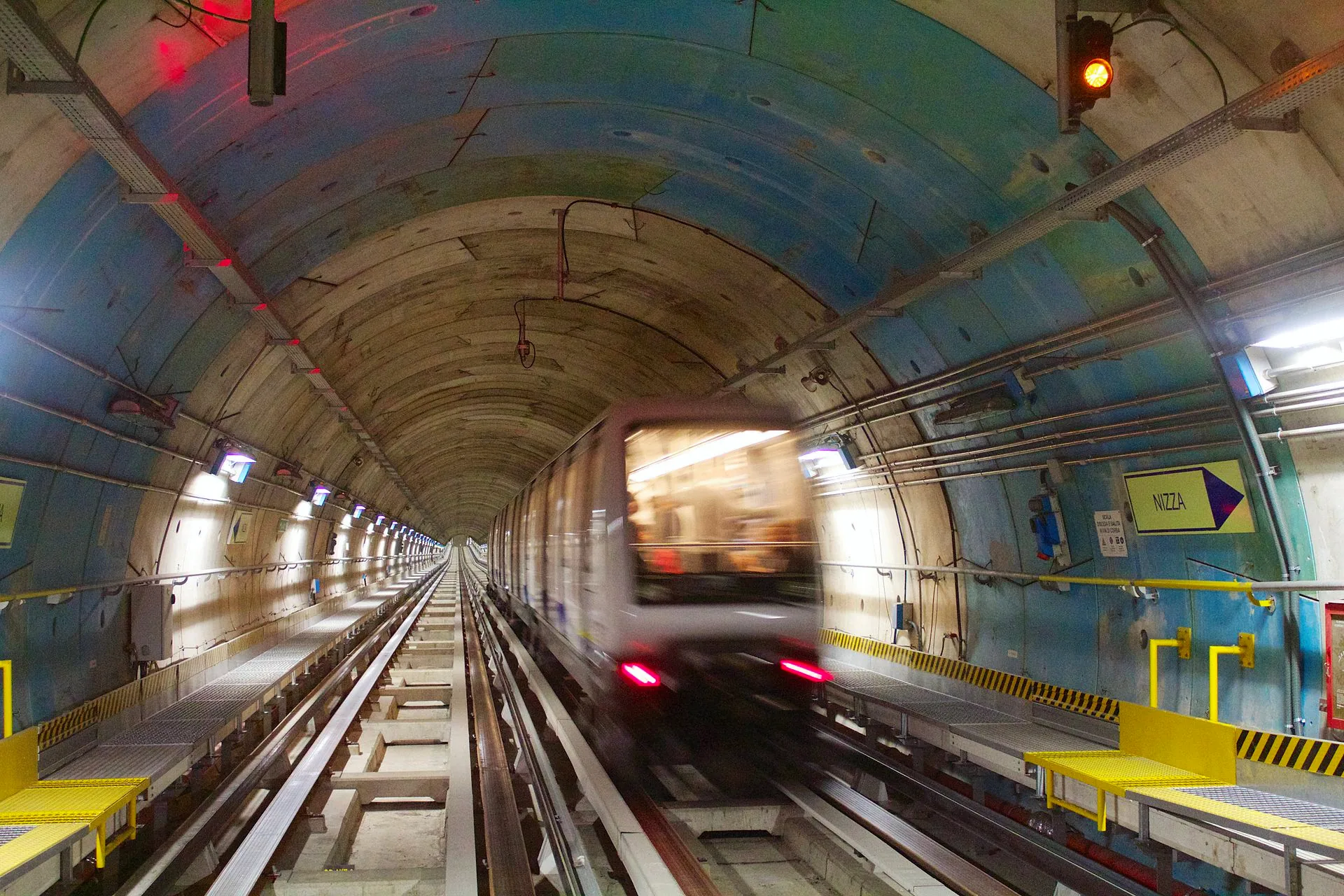 A Turin Metro train at a station.