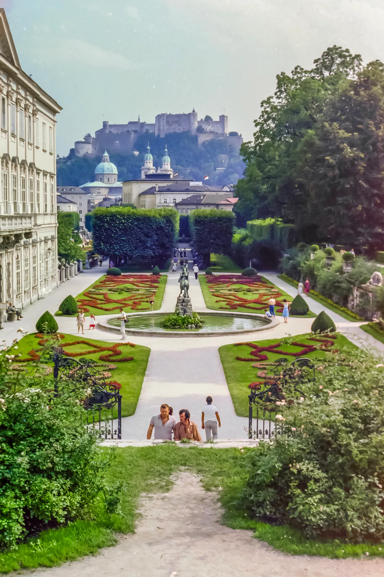 The Pegasus Fountain in Mirabell Gardens, with the Hohensalzburg Fortress visible beyond.