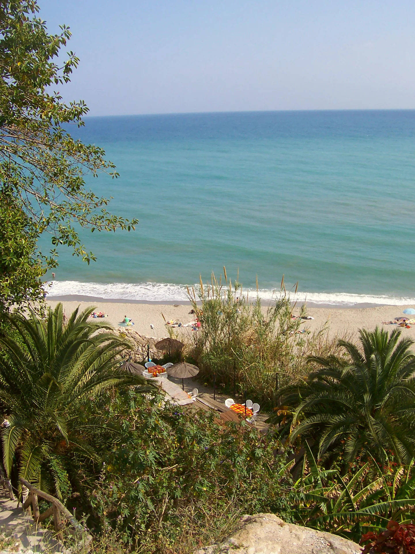 Burriana Beach in Nerja, with the shoreline and sea.