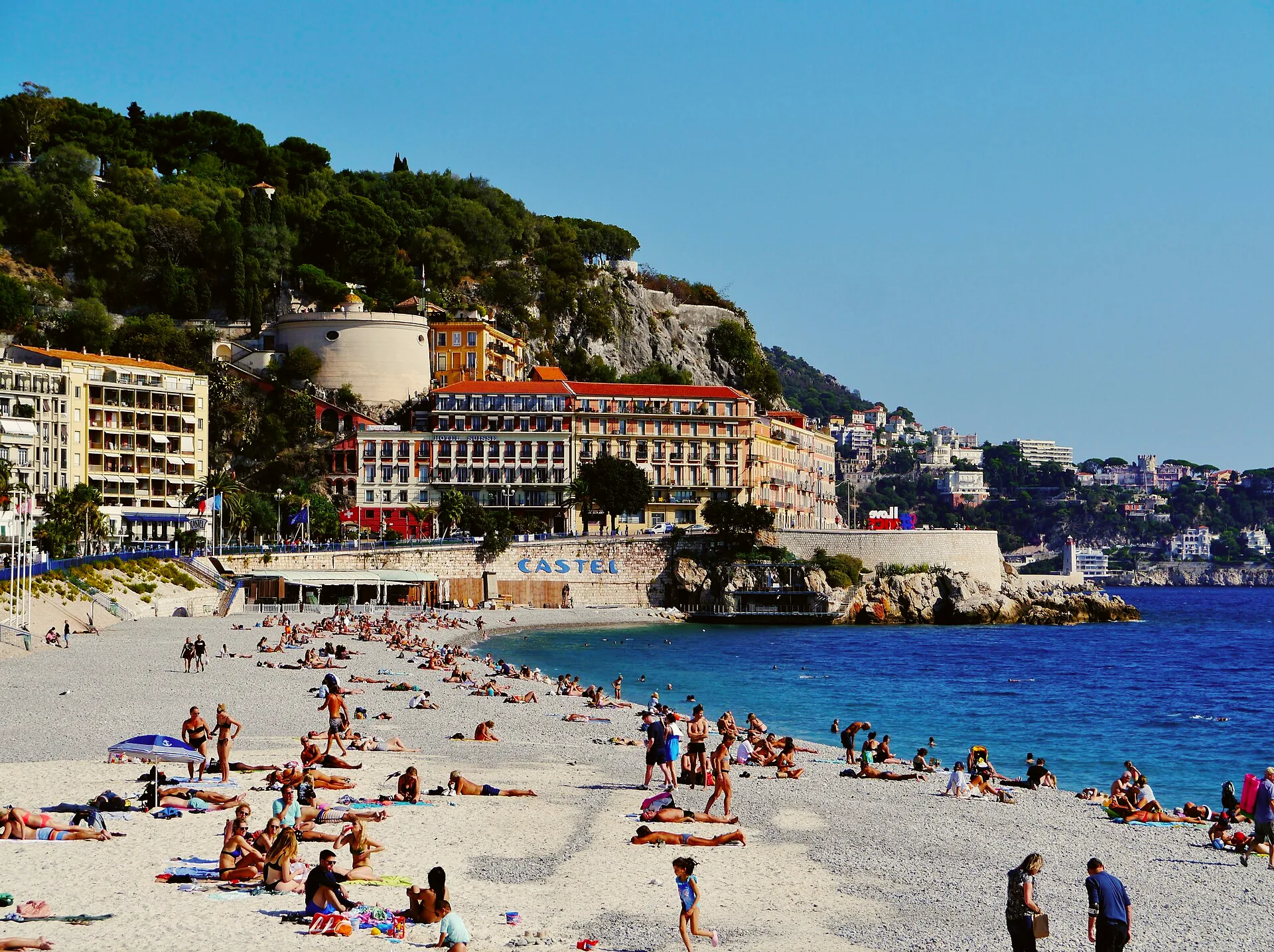 The pebble beach at Ponchettes in Nice, with the waterfront beyond.