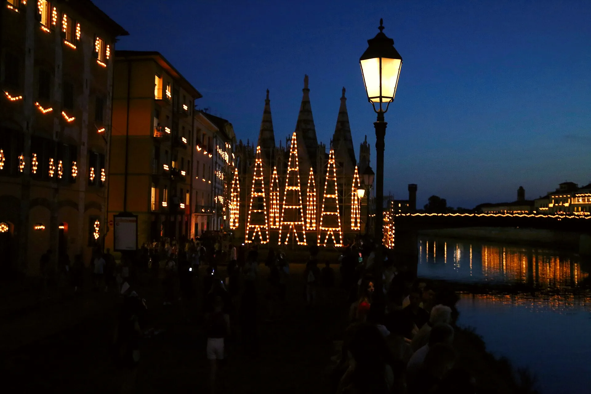 Lights along the Lungarno Gambacorti beside Santa Maria della Spina during Pisa’s Luminara di San Ranieri.