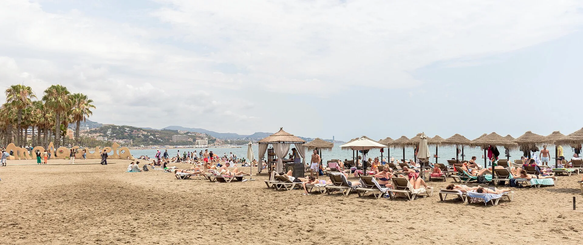 Shoreline of Playa de la Malagueta in Málaga, with the beach and sea.