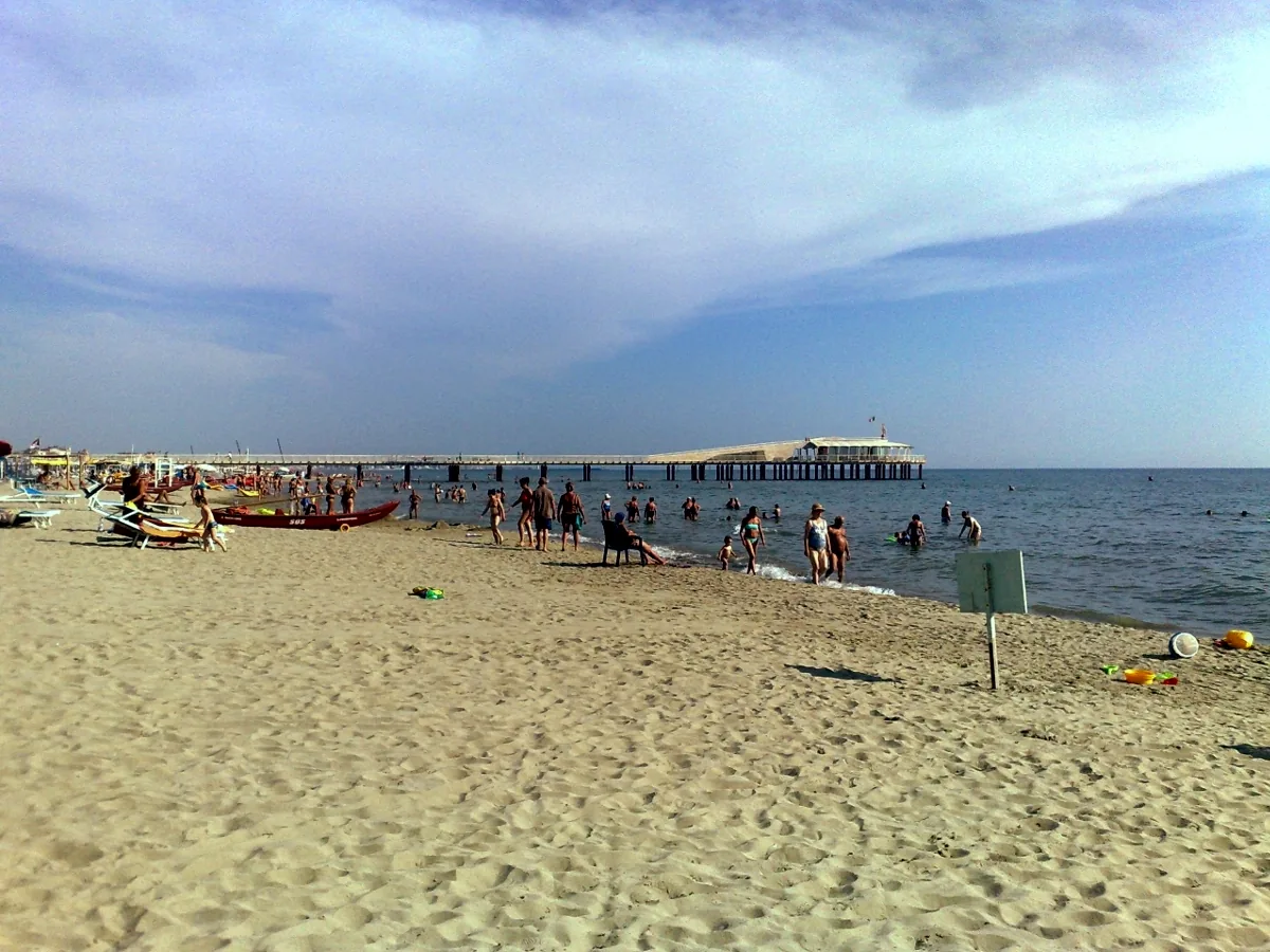 A pier extending from the beach at Lido di Camaiore.