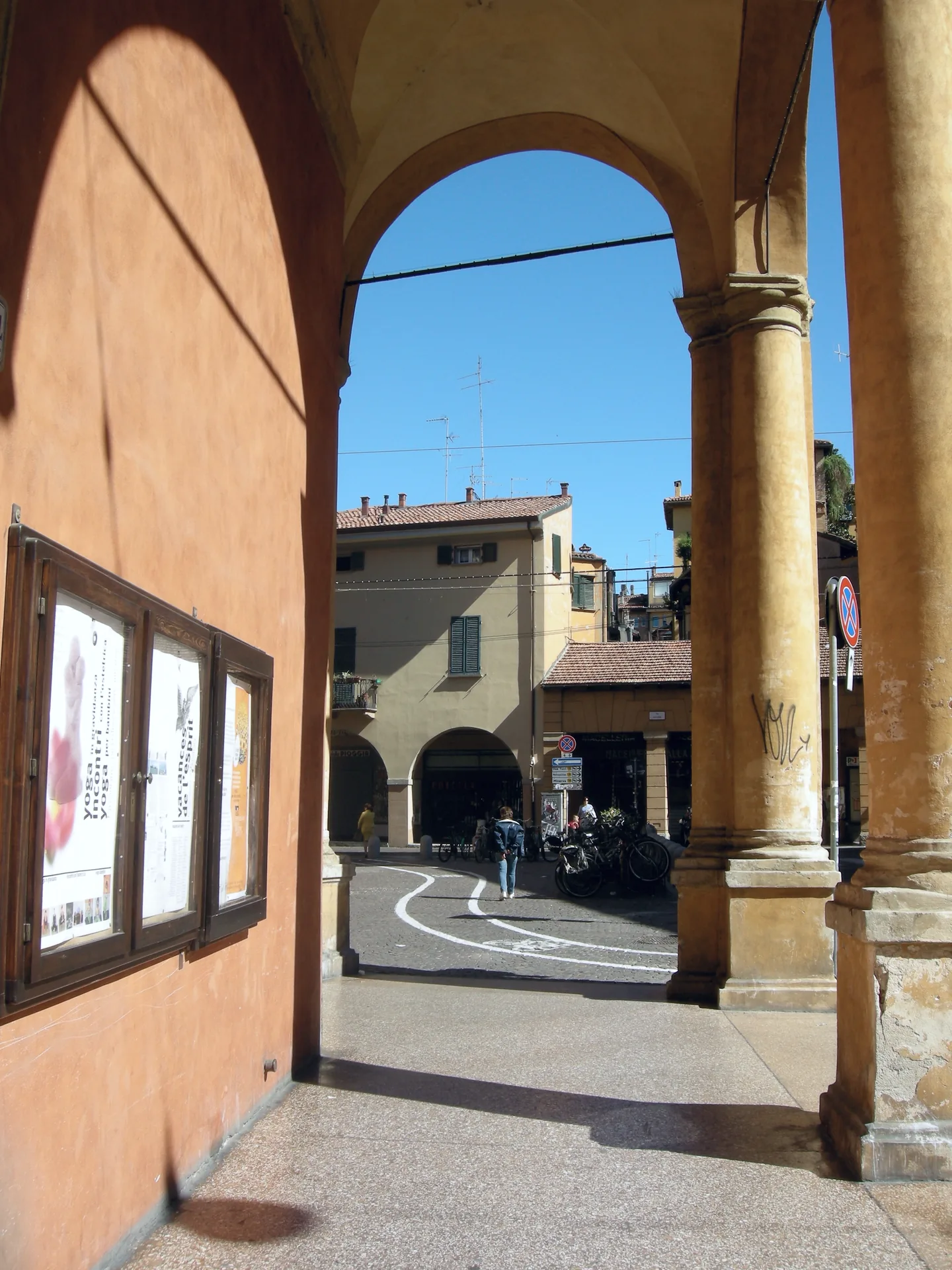 A covered portico on Piazza della Pioggia in Bologna.