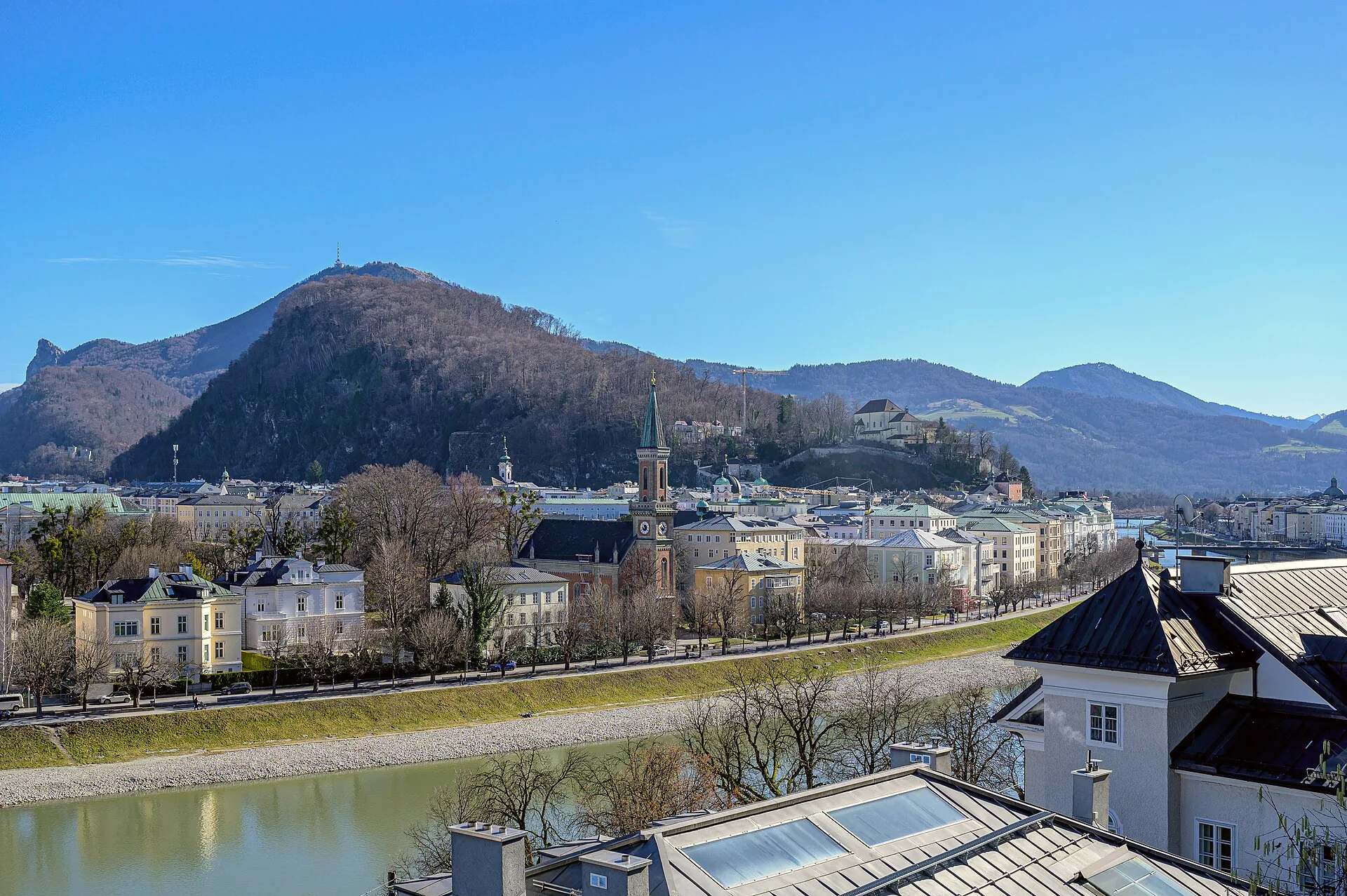 Salzburg’s old town beside the Salzach, with Kapuzinerberg rising behind it.
