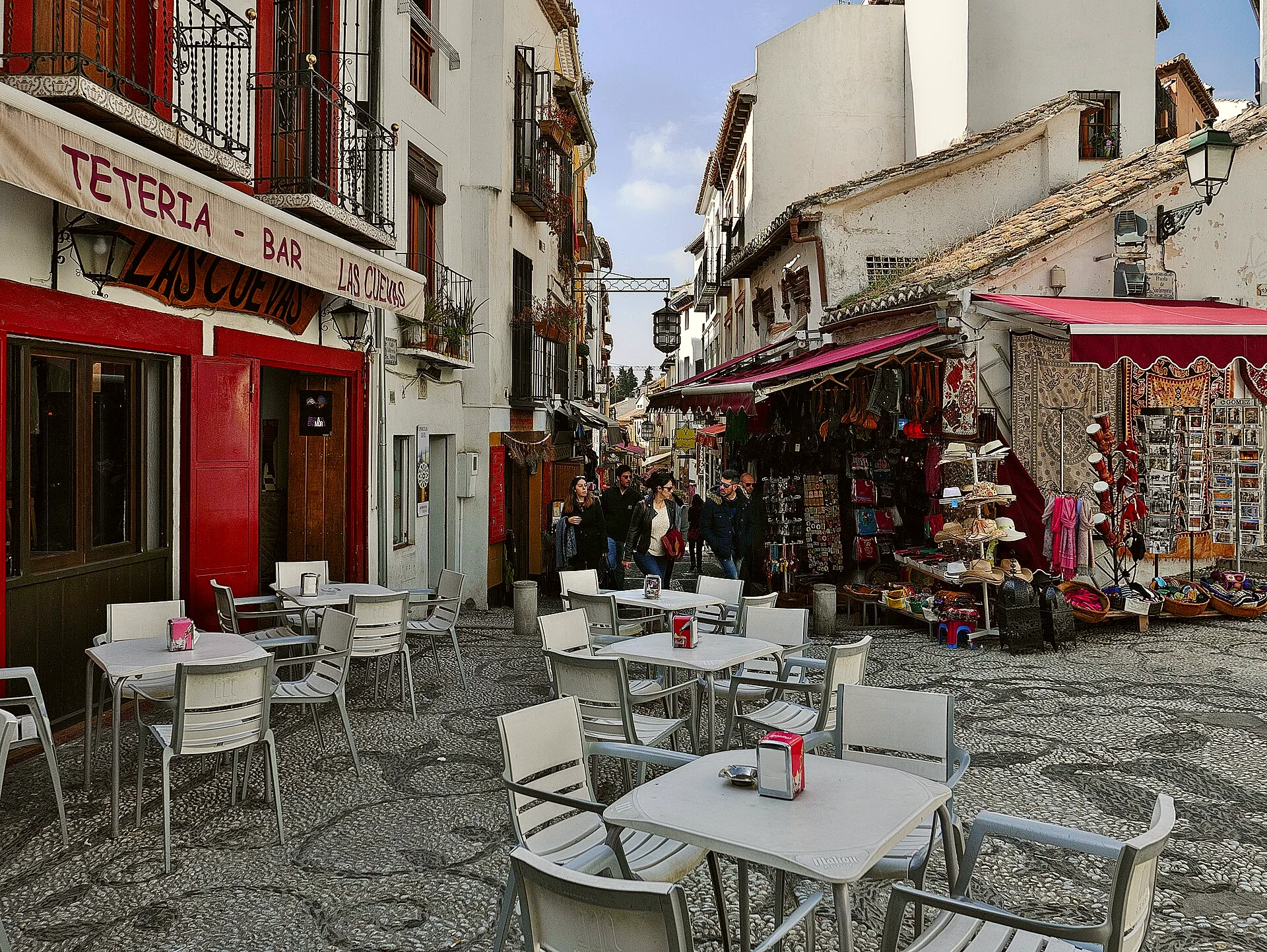 A street and small squares in the Albaicín district of Granada